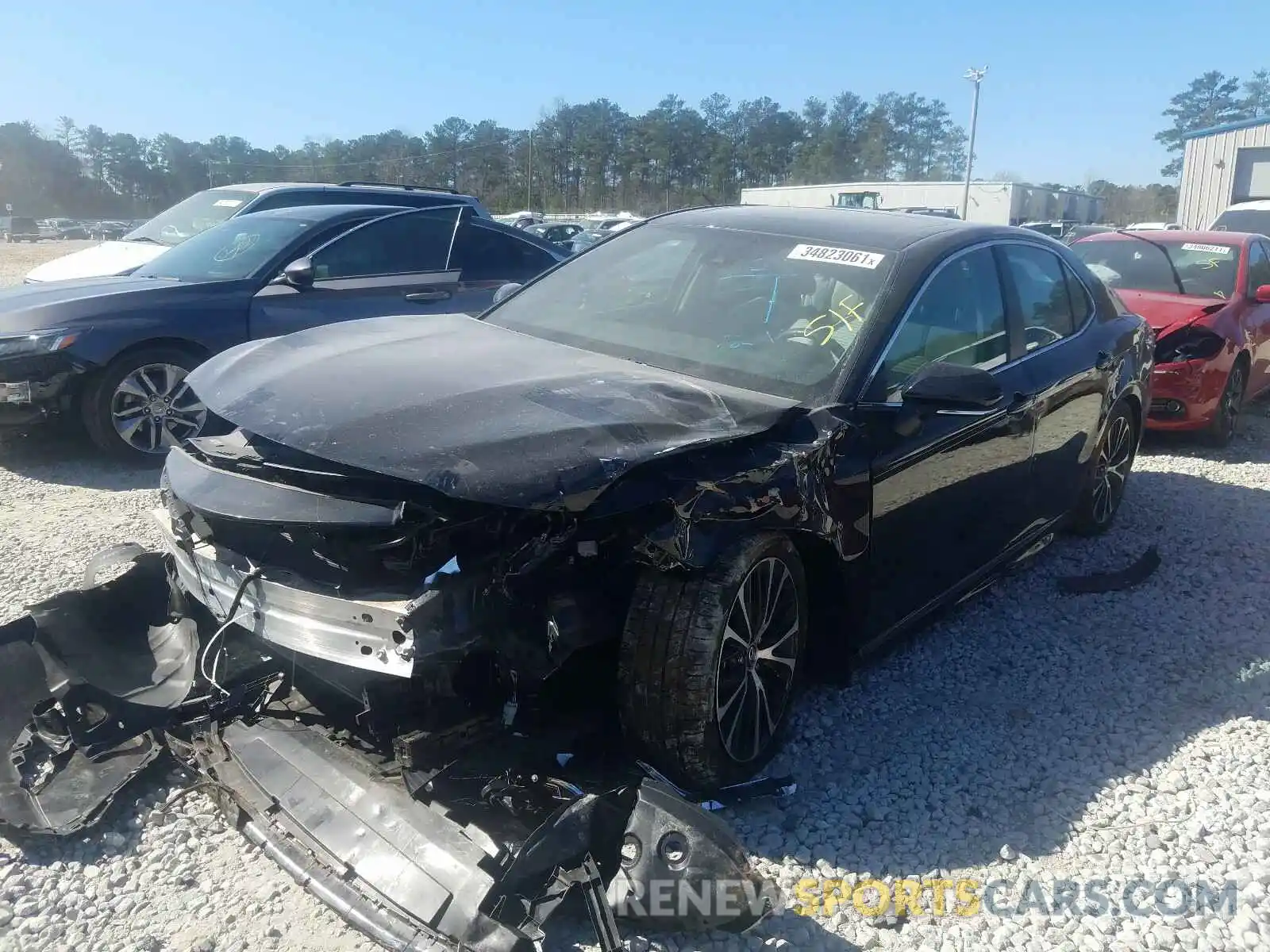 2 Photograph of a damaged car 4T1B11HK4KU702055 TOYOTA CAMRY 2019