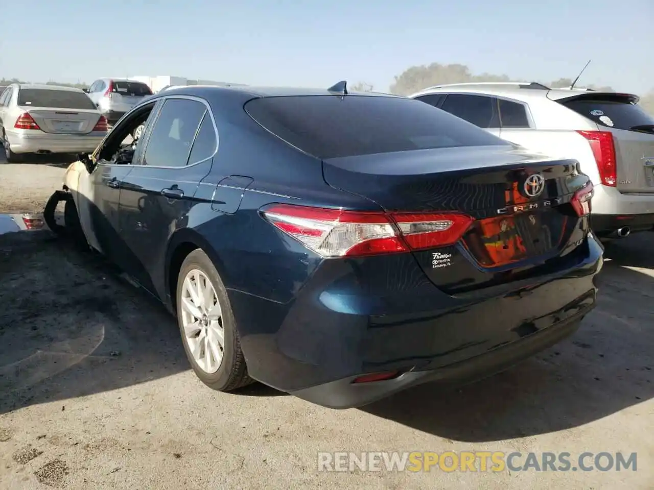 3 Photograph of a damaged car 4T1B11HK4KU702203 TOYOTA CAMRY 2019