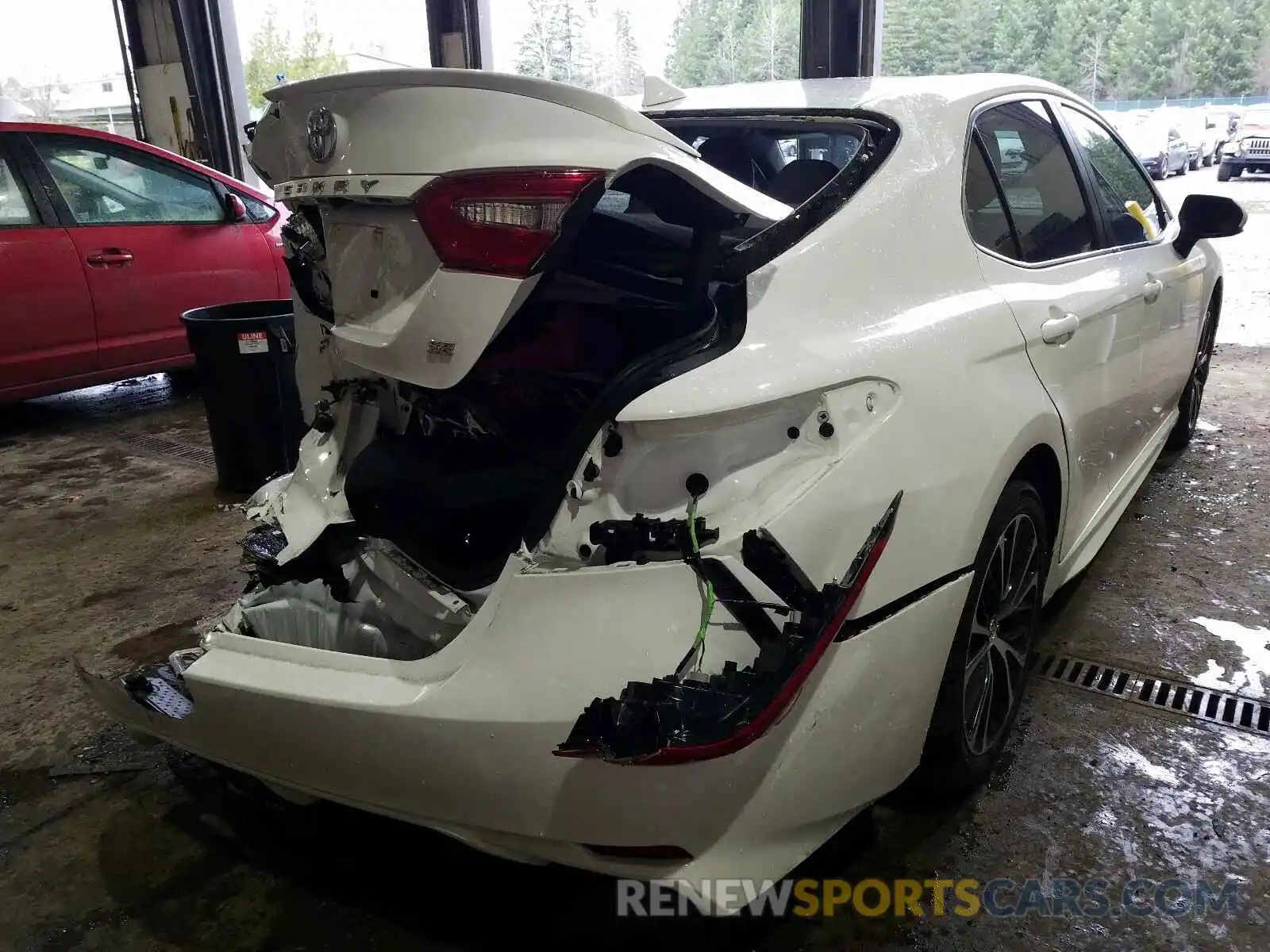 4 Photograph of a damaged car 4T1B11HK4KU702458 TOYOTA CAMRY 2019