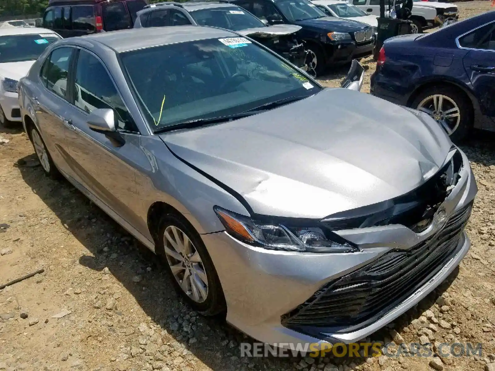 1 Photograph of a damaged car 4T1B11HK4KU702976 TOYOTA CAMRY 2019