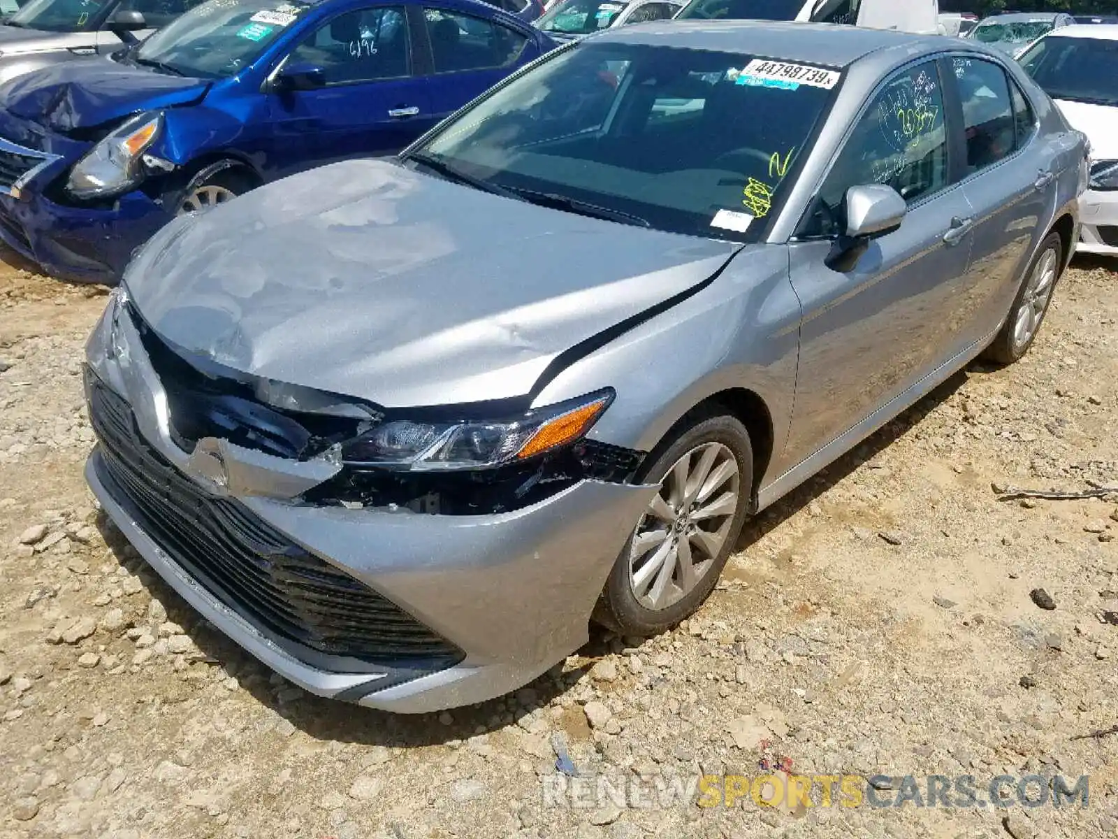 2 Photograph of a damaged car 4T1B11HK4KU702976 TOYOTA CAMRY 2019