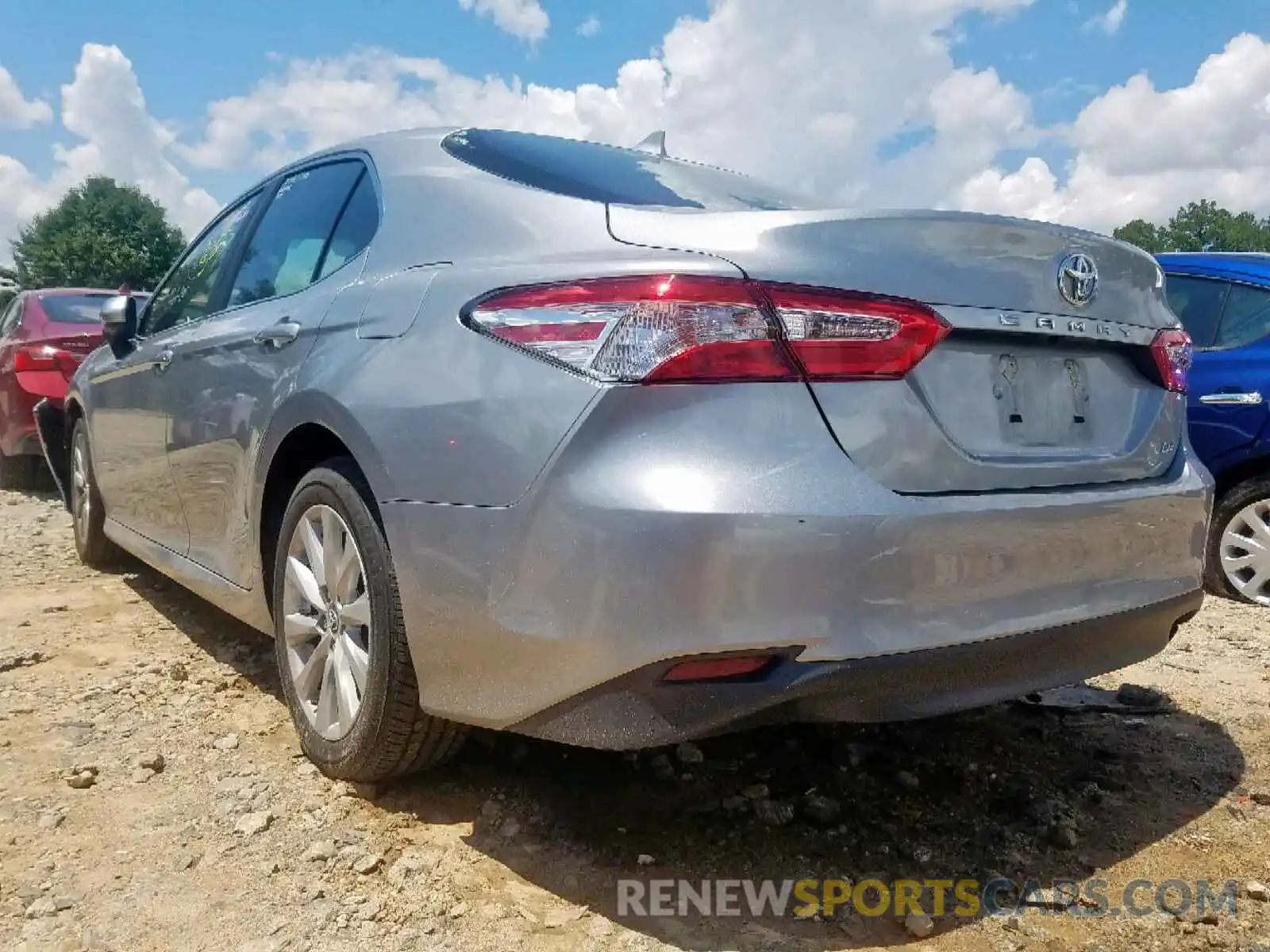 3 Photograph of a damaged car 4T1B11HK4KU702976 TOYOTA CAMRY 2019