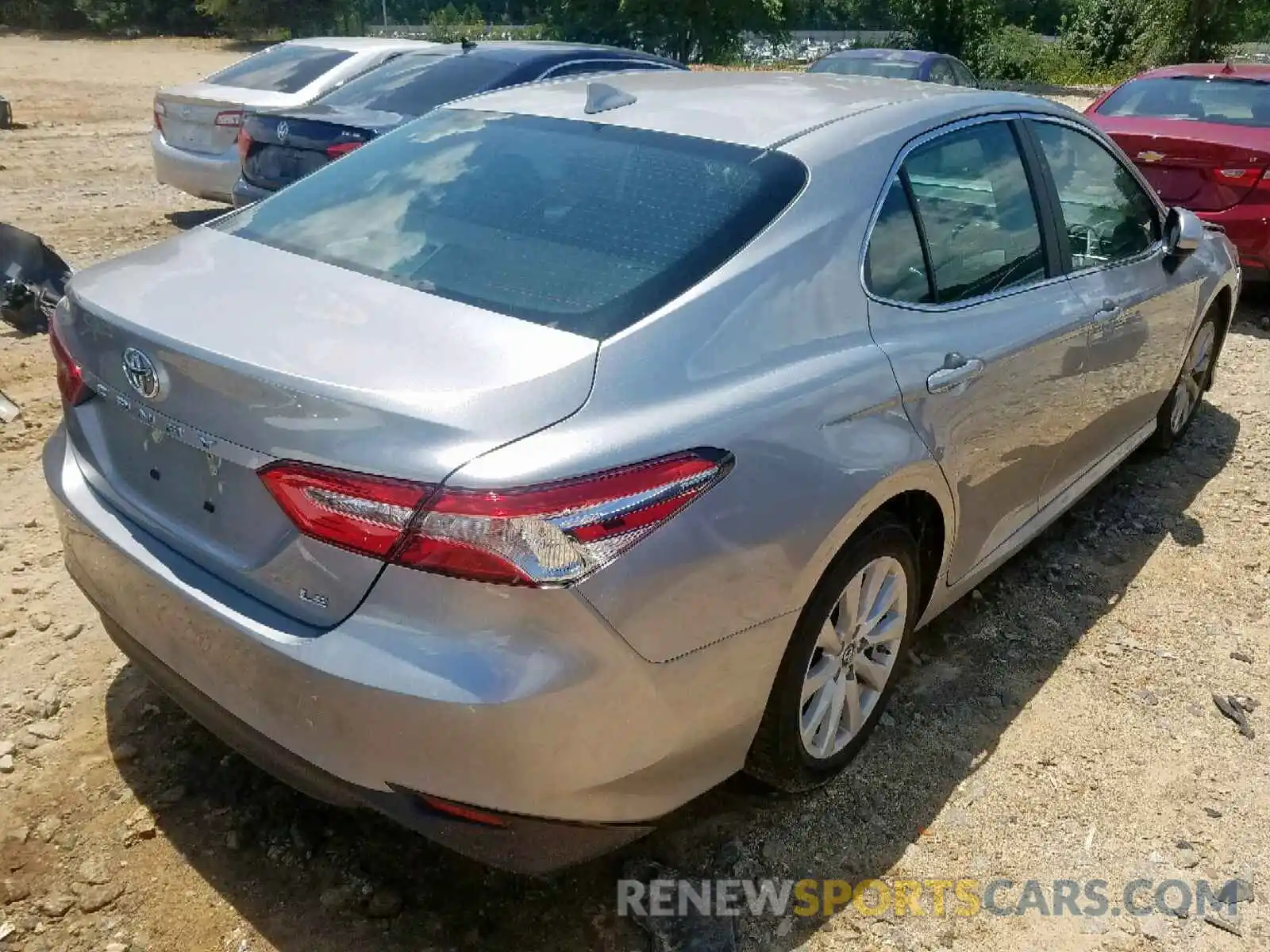 4 Photograph of a damaged car 4T1B11HK4KU702976 TOYOTA CAMRY 2019