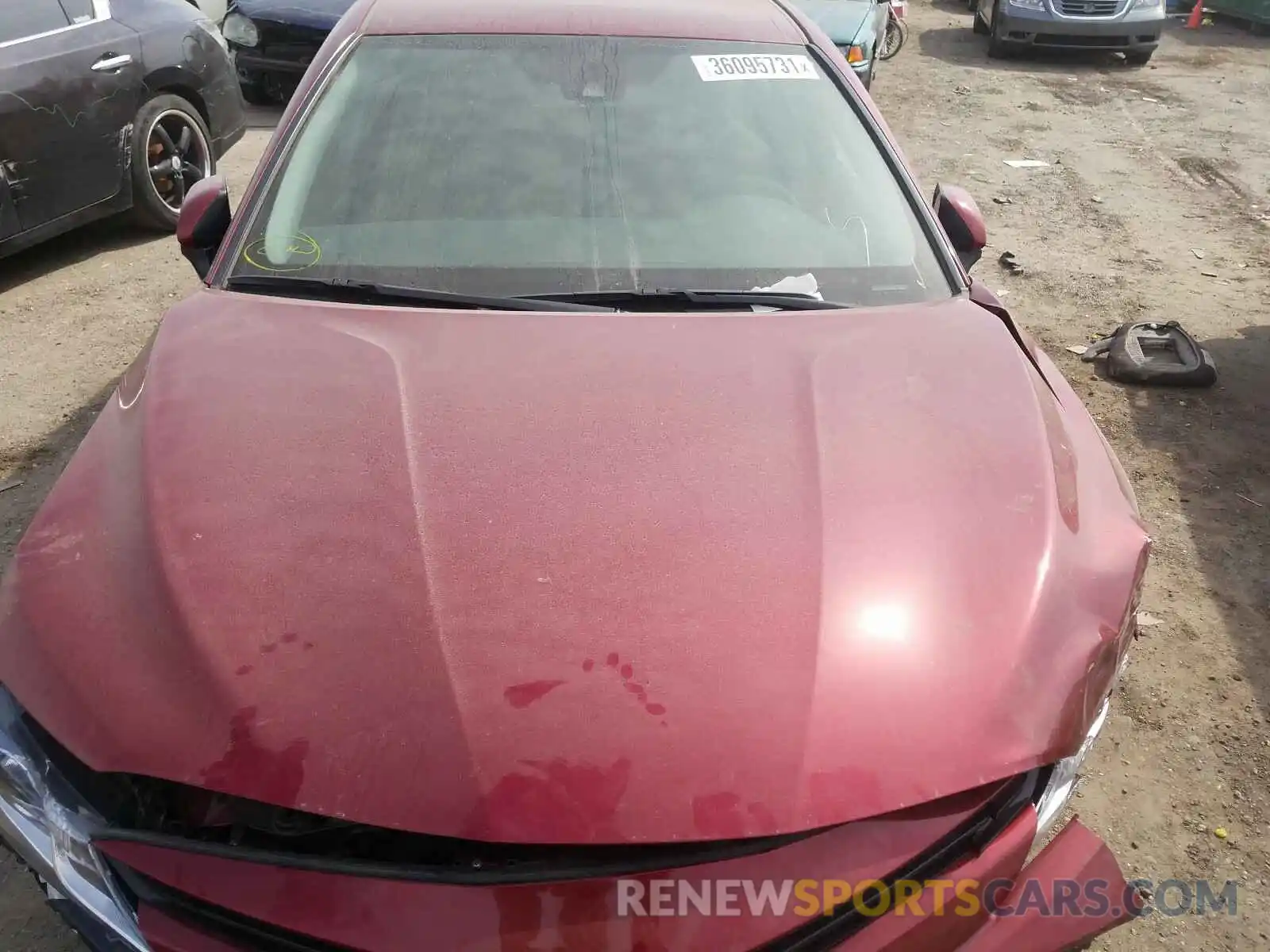 7 Photograph of a damaged car 4T1B11HK4KU703870 TOYOTA CAMRY 2019