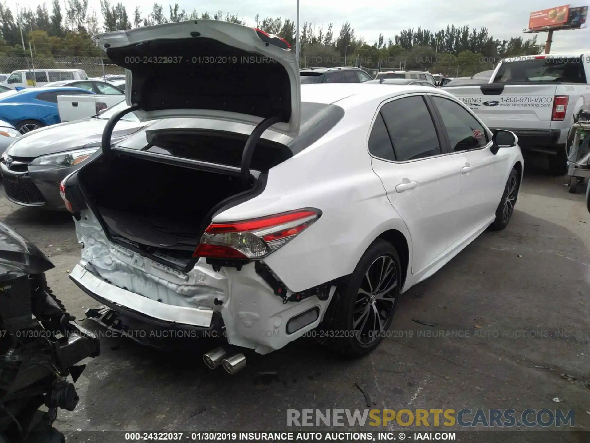 4 Photograph of a damaged car 4T1B11HK4KU704517 TOYOTA CAMRY 2019