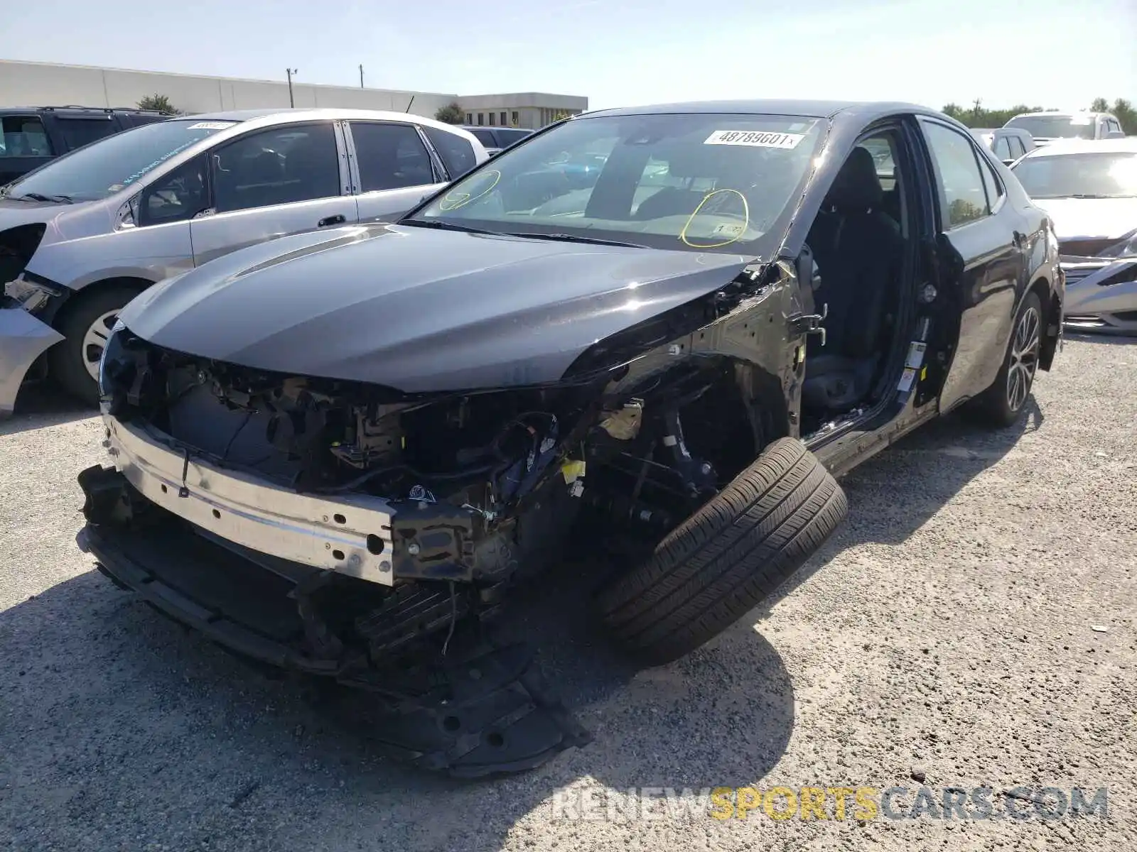 2 Photograph of a damaged car 4T1B11HK4KU706459 TOYOTA CAMRY 2019