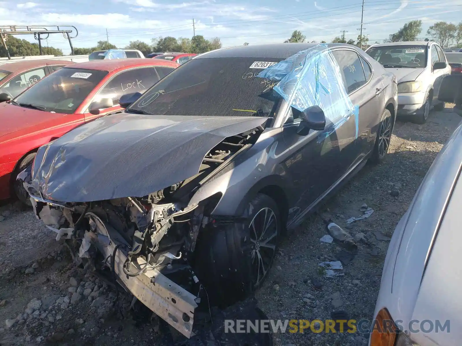 2 Photograph of a damaged car 4T1B11HK4KU706820 TOYOTA CAMRY 2019