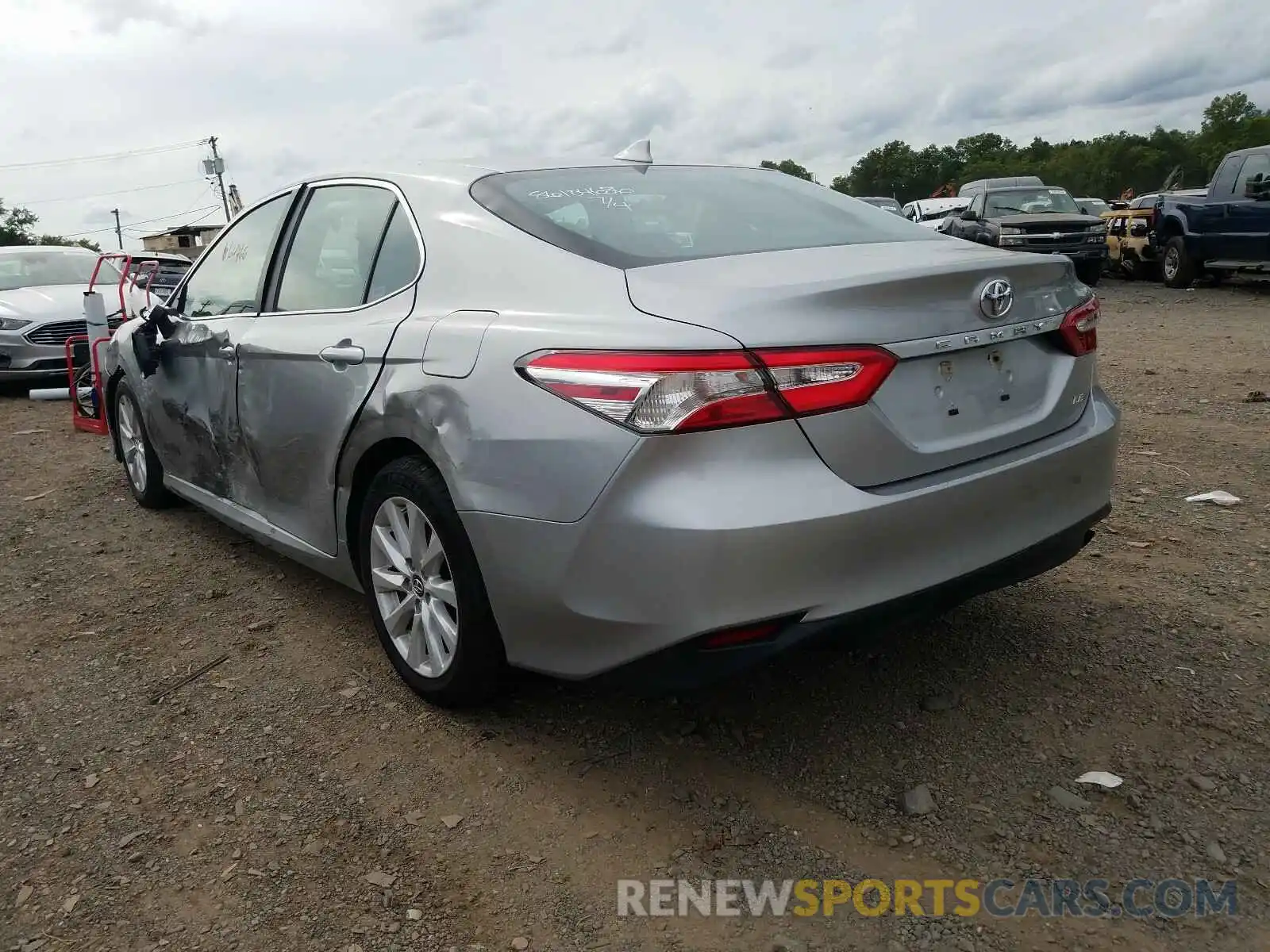 3 Photograph of a damaged car 4T1B11HK4KU707756 TOYOTA CAMRY 2019