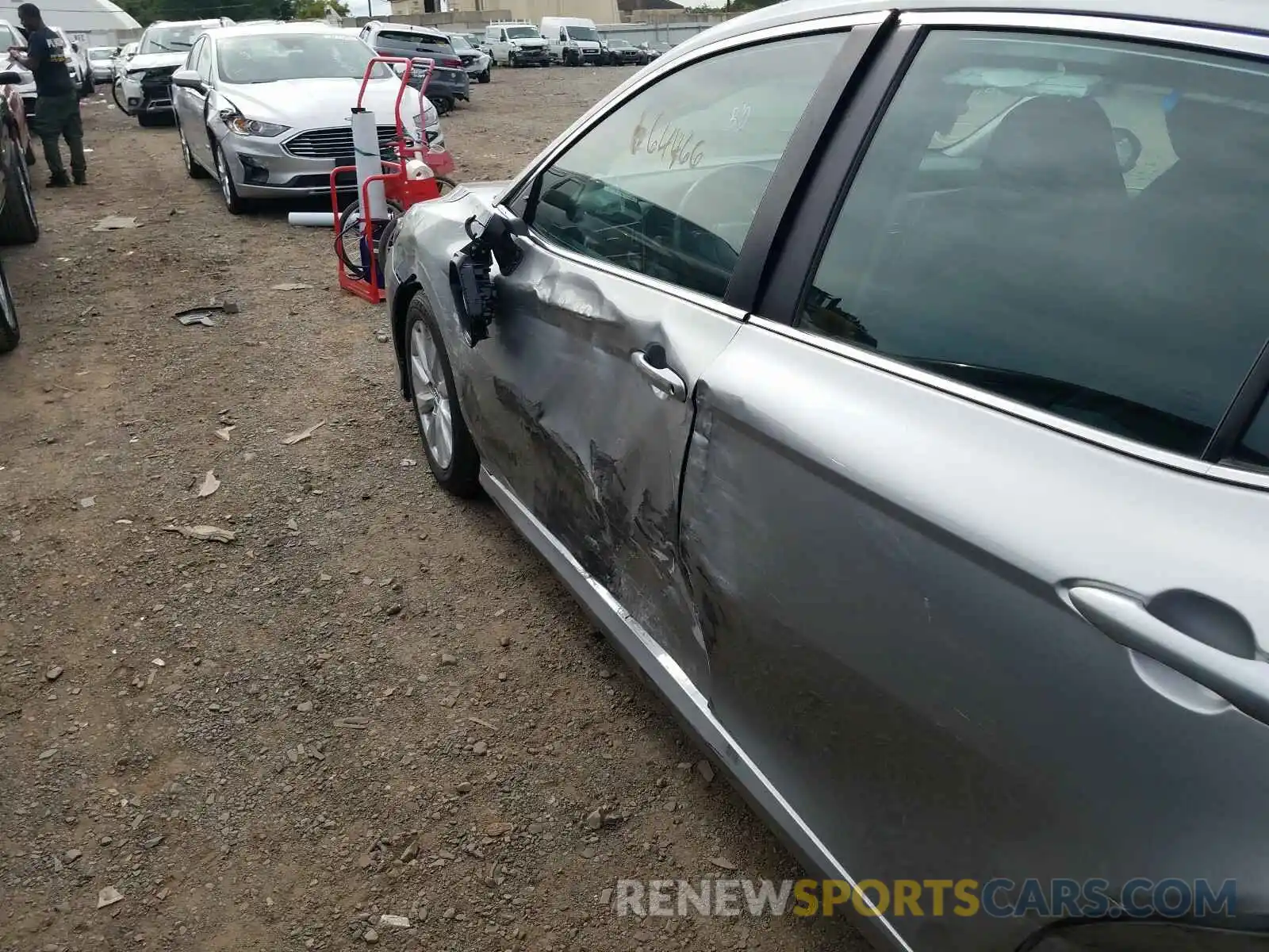 9 Photograph of a damaged car 4T1B11HK4KU707756 TOYOTA CAMRY 2019