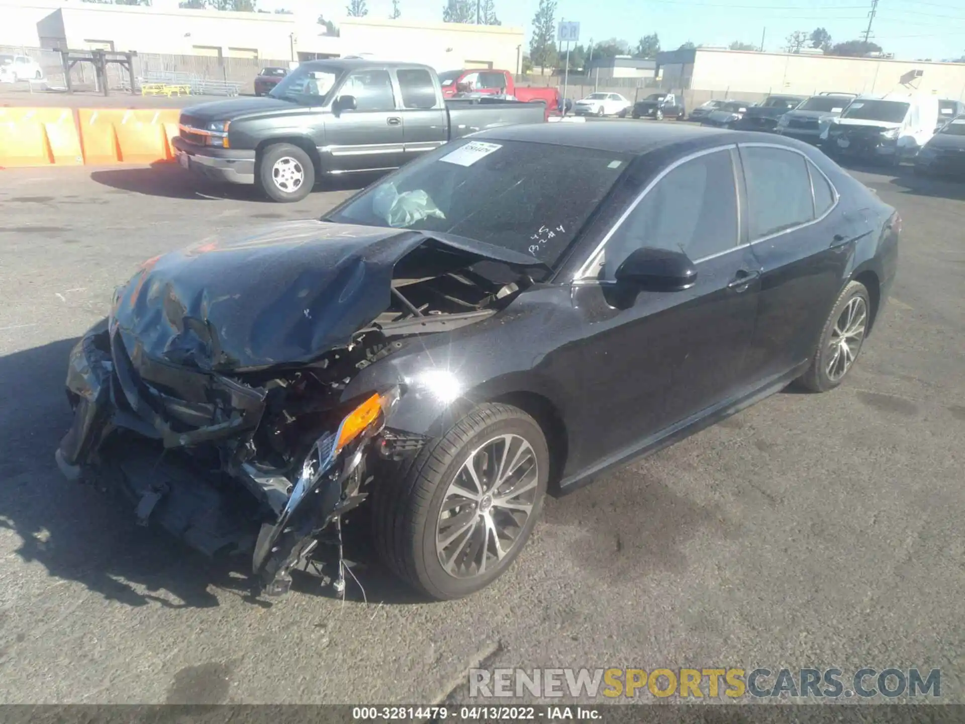 2 Photograph of a damaged car 4T1B11HK4KU708874 TOYOTA CAMRY 2019