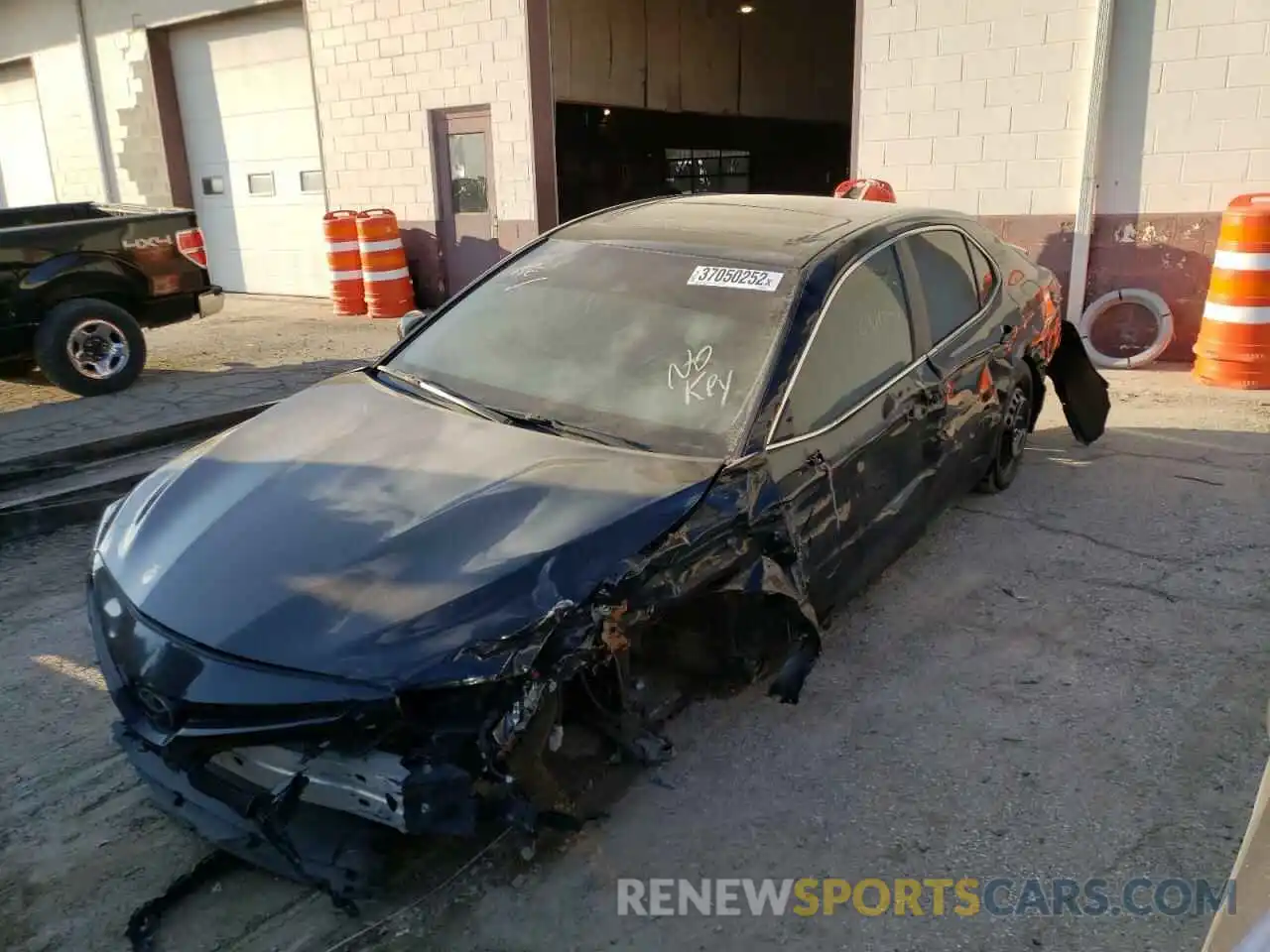 2 Photograph of a damaged car 4T1B11HK4KU708986 TOYOTA CAMRY 2019