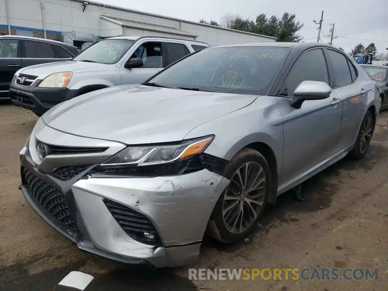 2 Photograph of a damaged car 4T1B11HK4KU709149 TOYOTA CAMRY 2019