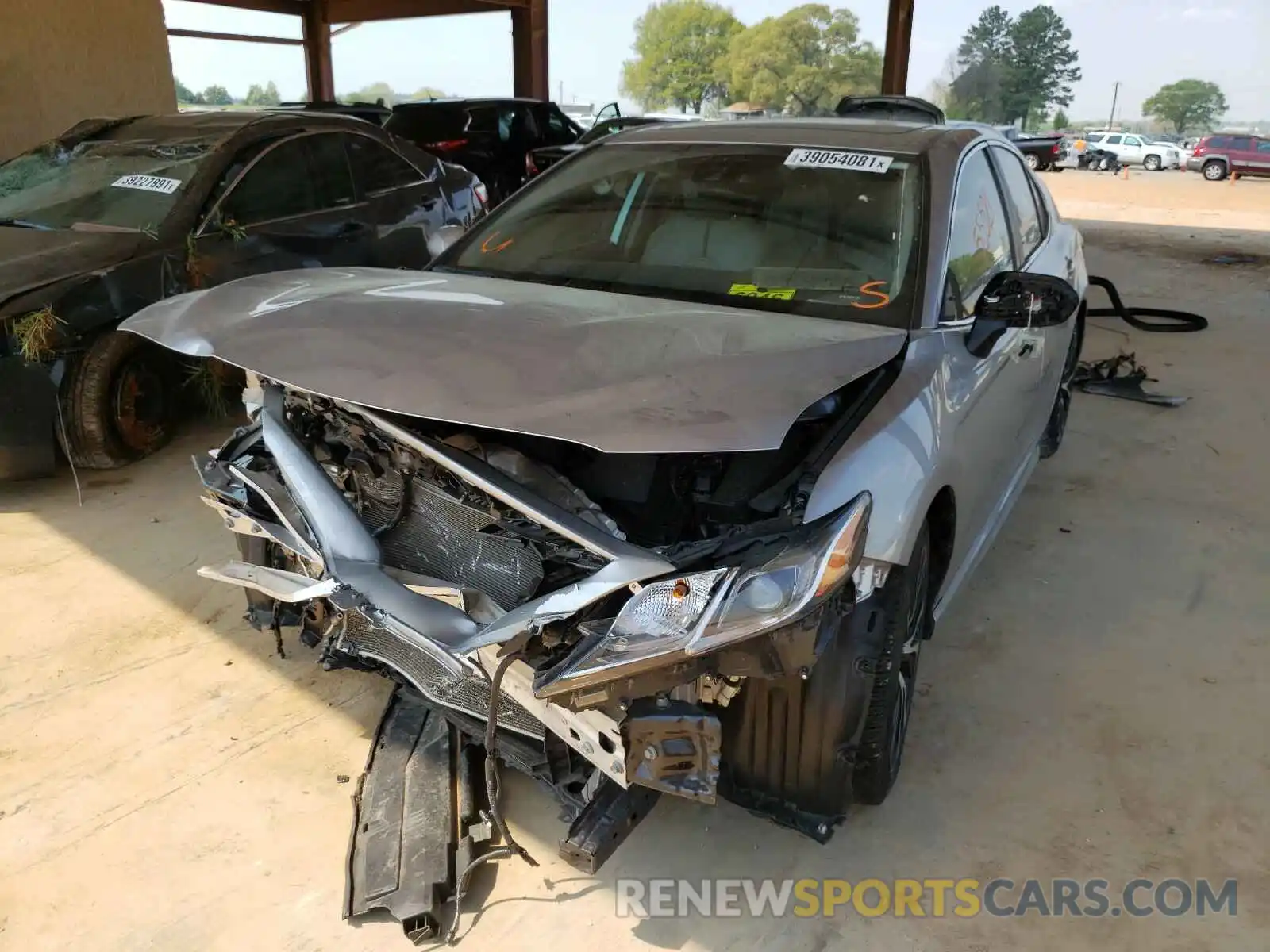 2 Photograph of a damaged car 4T1B11HK4KU709443 TOYOTA CAMRY 2019