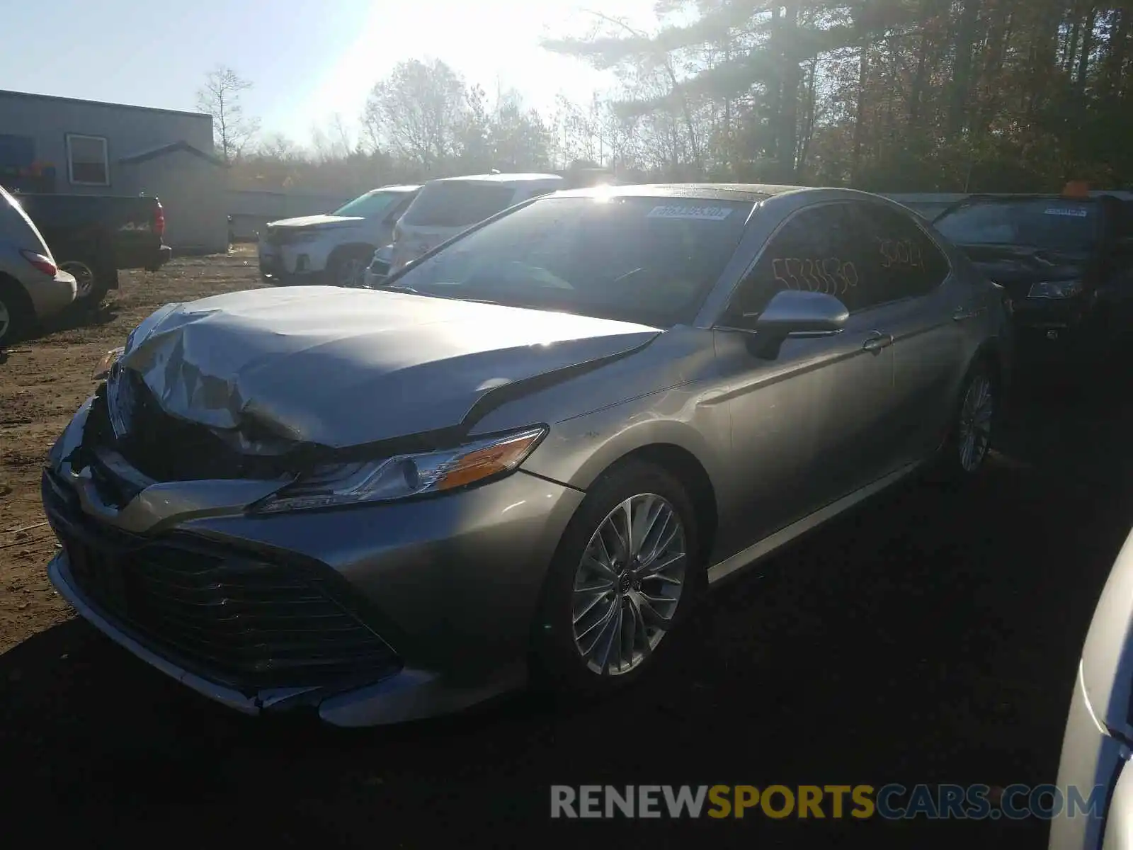 2 Photograph of a damaged car 4T1B11HK4KU710933 TOYOTA CAMRY 2019