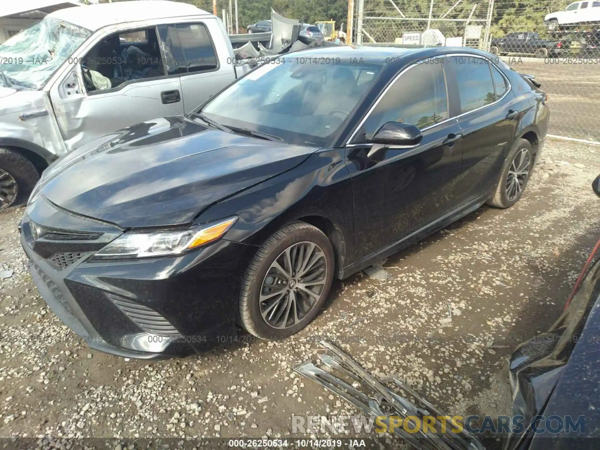 2 Photograph of a damaged car 4T1B11HK4KU711371 TOYOTA CAMRY 2019