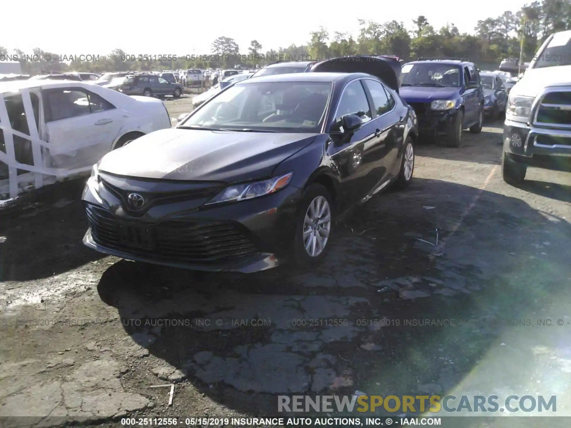 2 Photograph of a damaged car 4T1B11HK4KU714433 TOYOTA CAMRY 2019