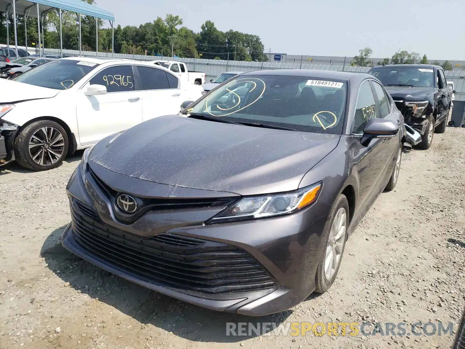 2 Photograph of a damaged car 4T1B11HK4KU714755 TOYOTA CAMRY 2019