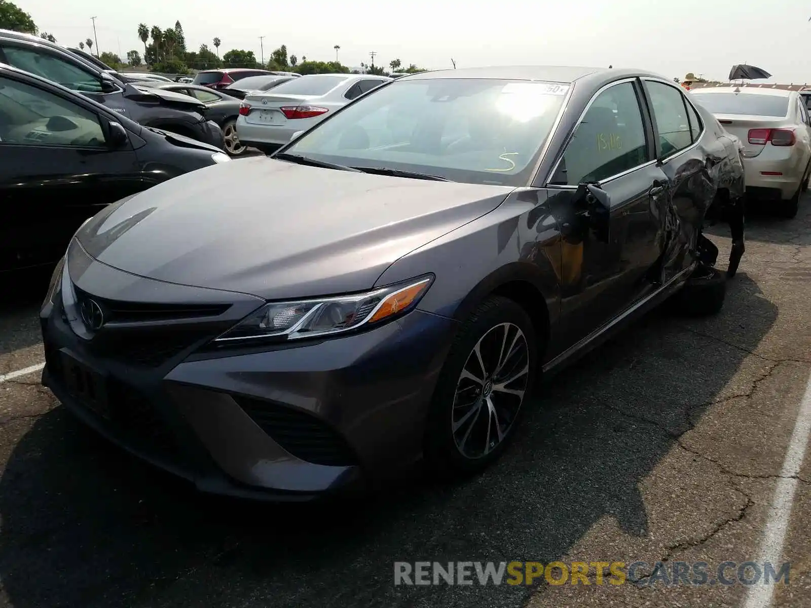 2 Photograph of a damaged car 4T1B11HK4KU715324 TOYOTA CAMRY 2019