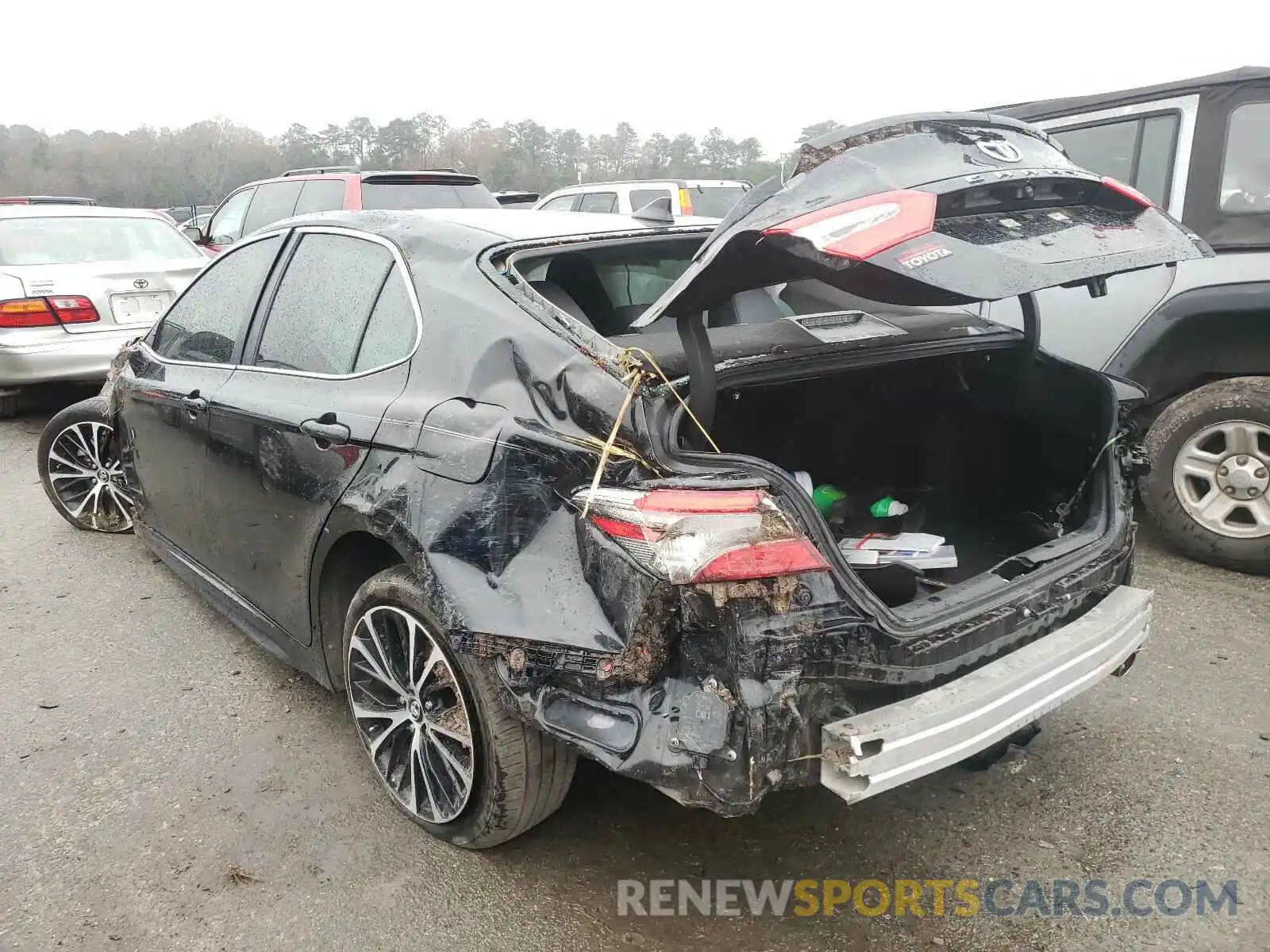 3 Photograph of a damaged car 4T1B11HK4KU715727 TOYOTA CAMRY 2019