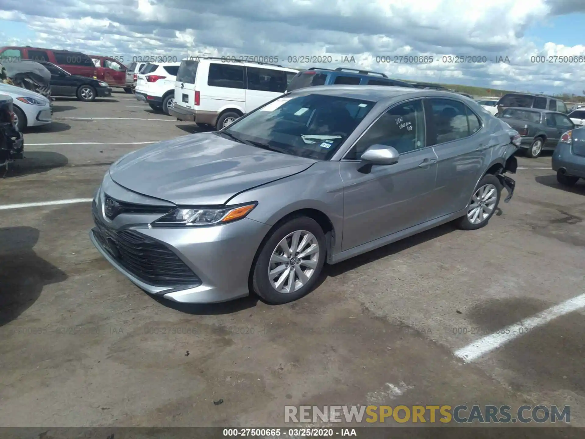 2 Photograph of a damaged car 4T1B11HK4KU715906 TOYOTA CAMRY 2019