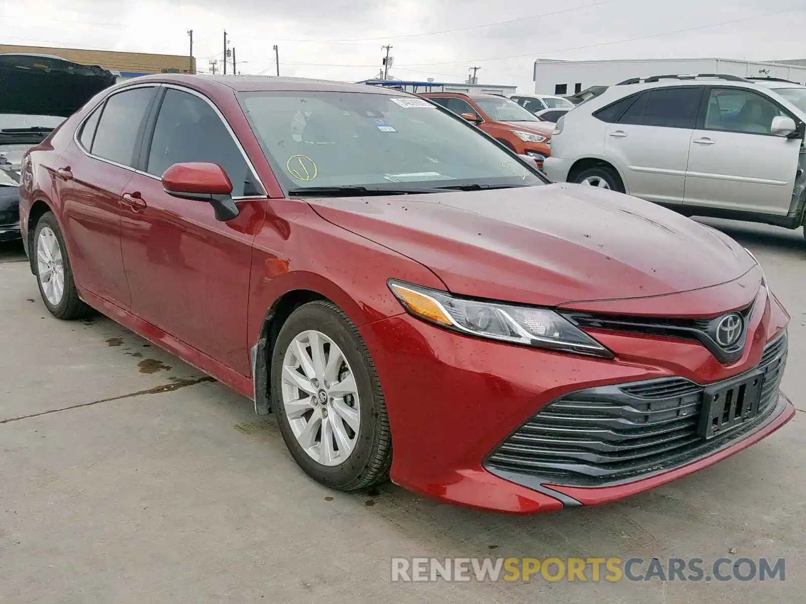 1 Photograph of a damaged car 4T1B11HK4KU716103 TOYOTA CAMRY 2019