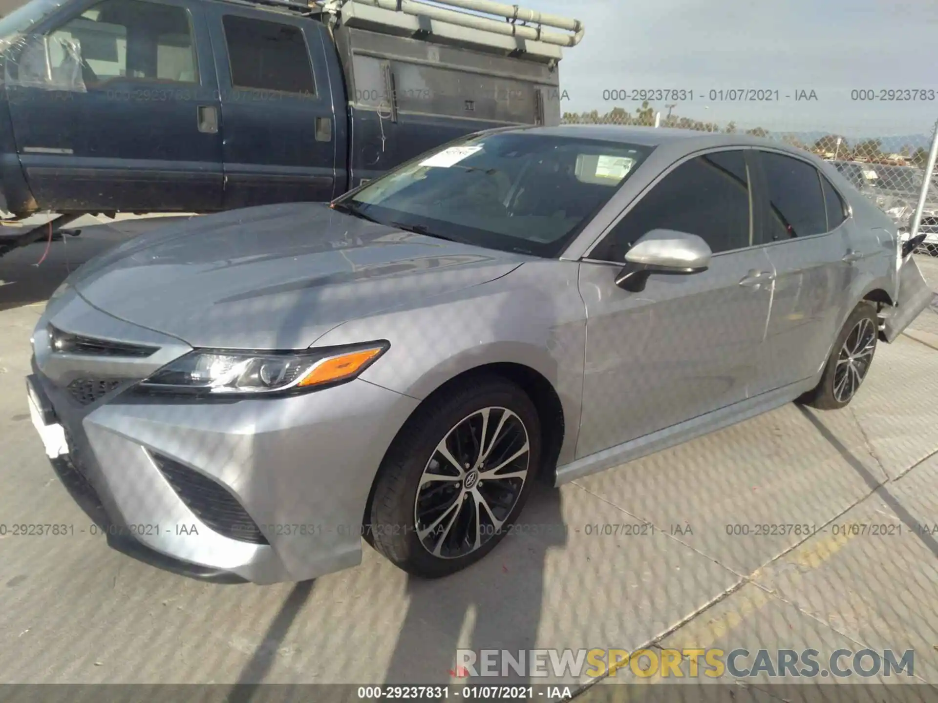 2 Photograph of a damaged car 4T1B11HK4KU717669 TOYOTA CAMRY 2019