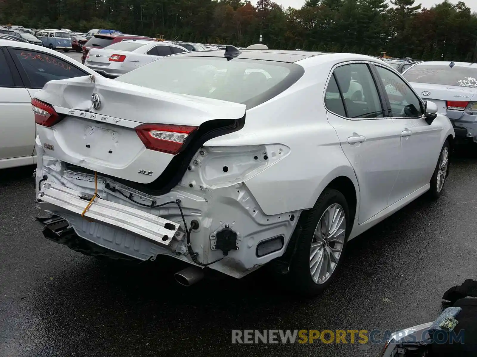 4 Photograph of a damaged car 4T1B11HK4KU719535 TOYOTA CAMRY 2019