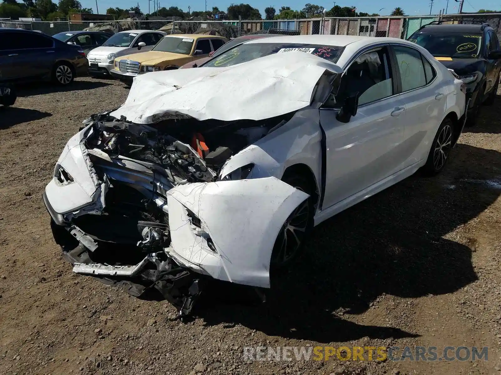 2 Photograph of a damaged car 4T1B11HK4KU719759 TOYOTA CAMRY 2019