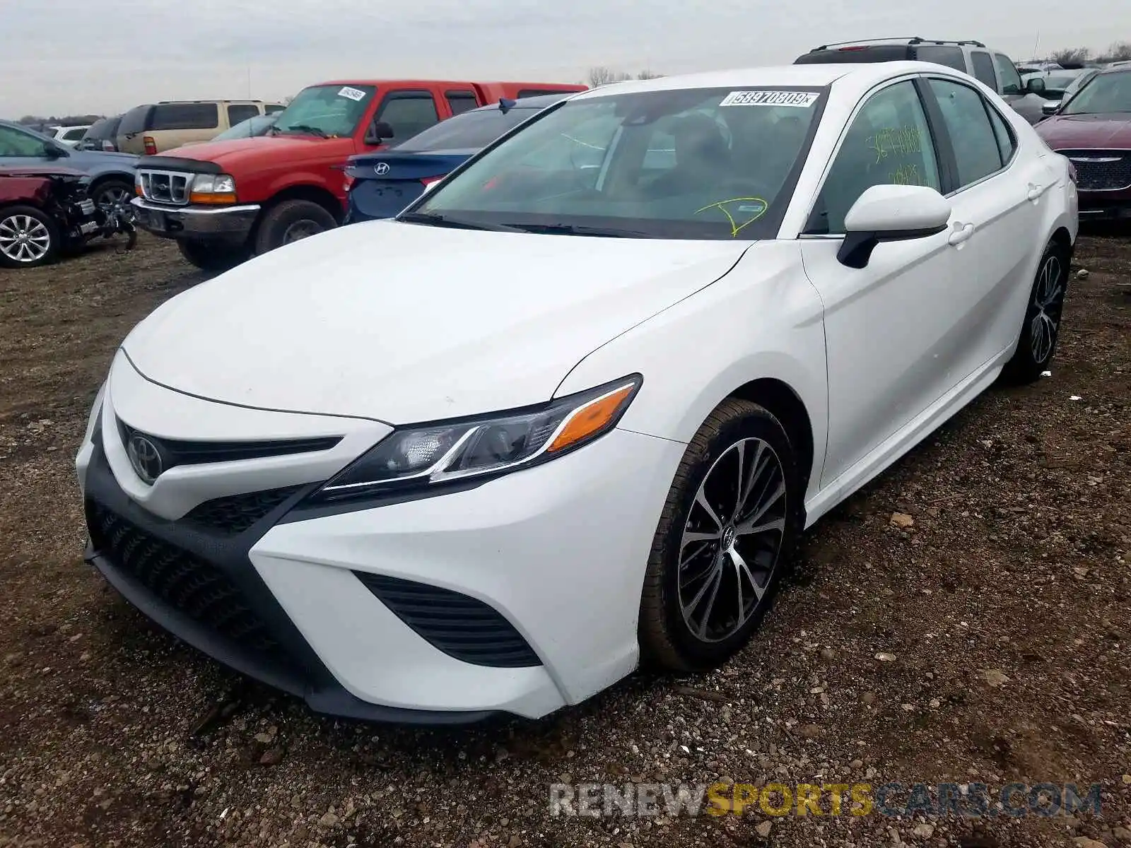 2 Photograph of a damaged car 4T1B11HK4KU720345 TOYOTA CAMRY 2019