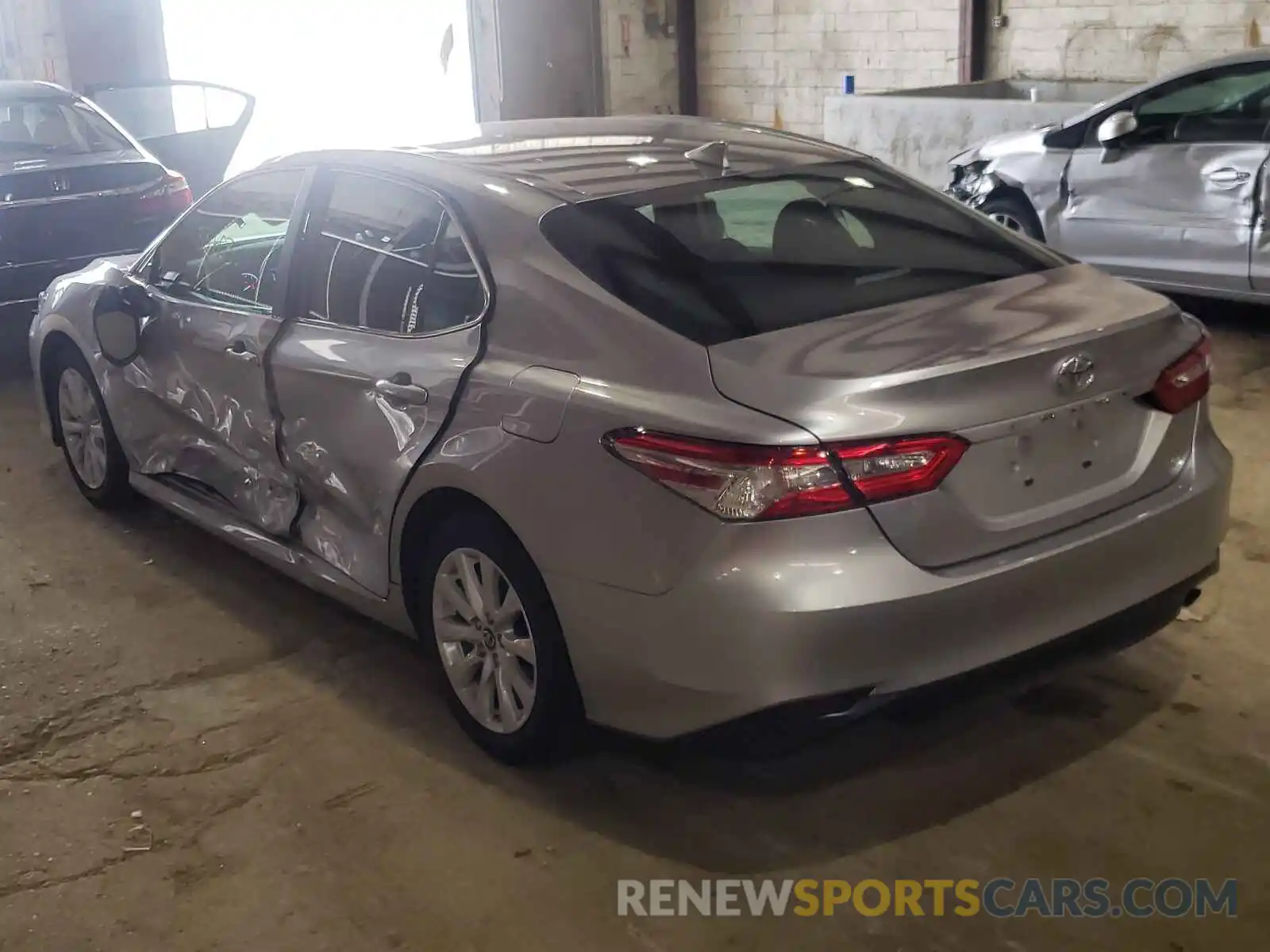 3 Photograph of a damaged car 4T1B11HK4KU722791 TOYOTA CAMRY 2019