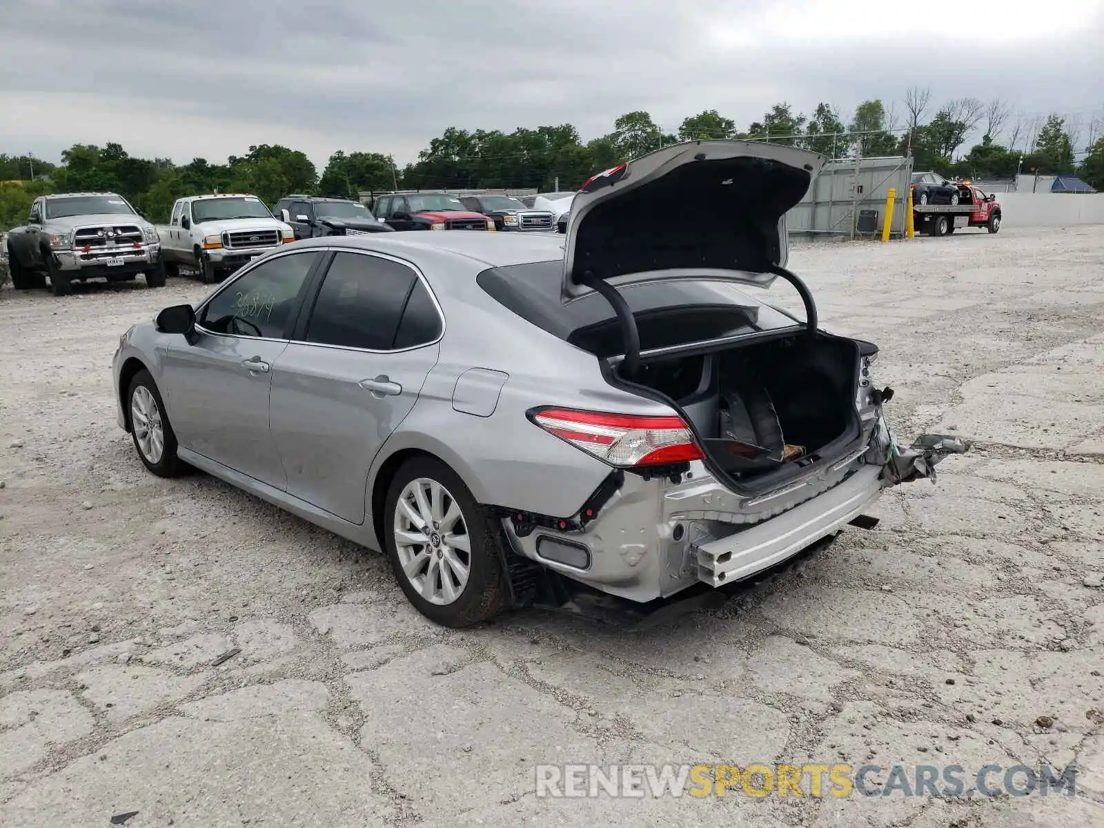 3 Photograph of a damaged car 4T1B11HK4KU723827 TOYOTA CAMRY 2019