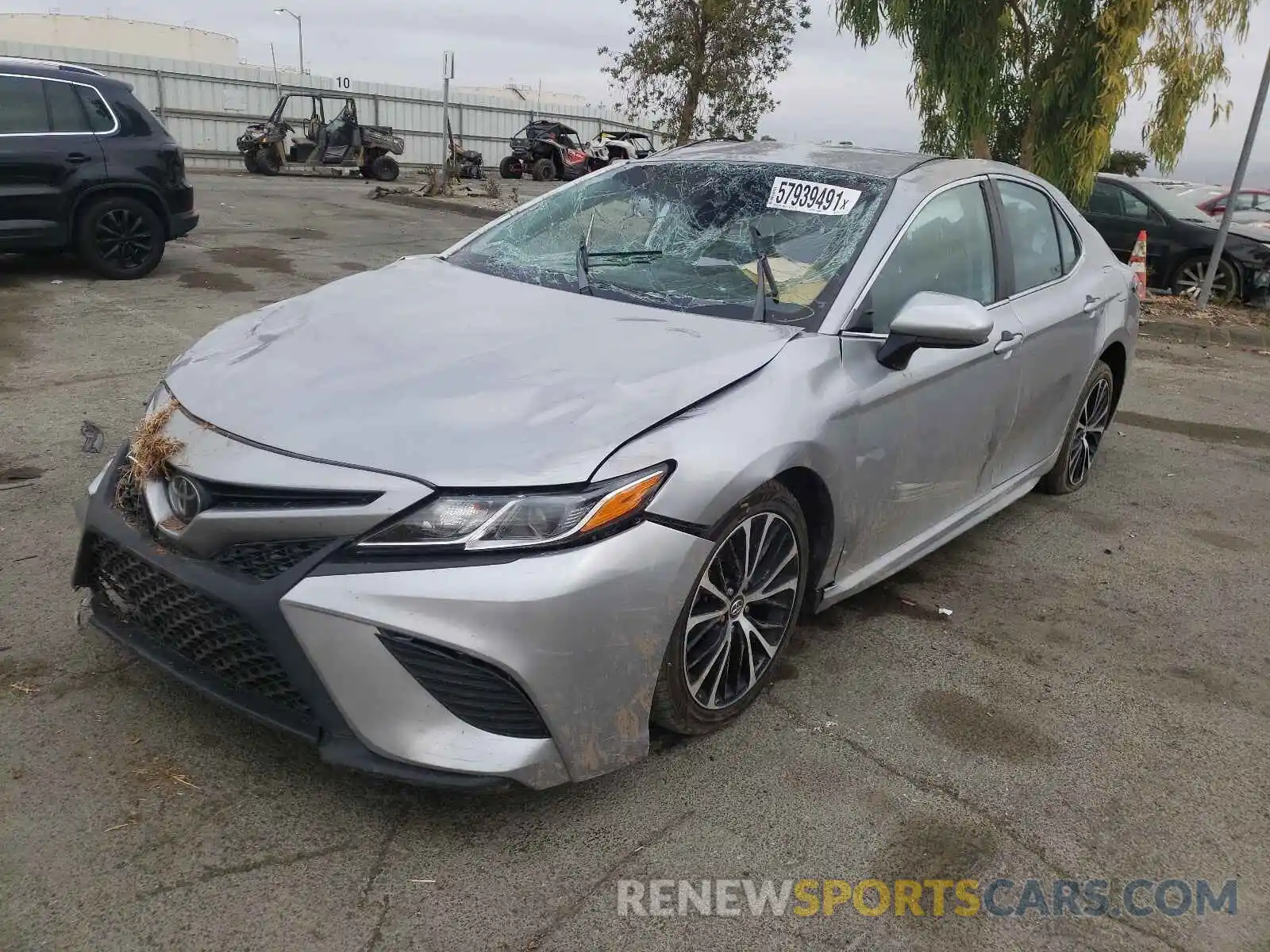 2 Photograph of a damaged car 4T1B11HK4KU725013 TOYOTA CAMRY 2019