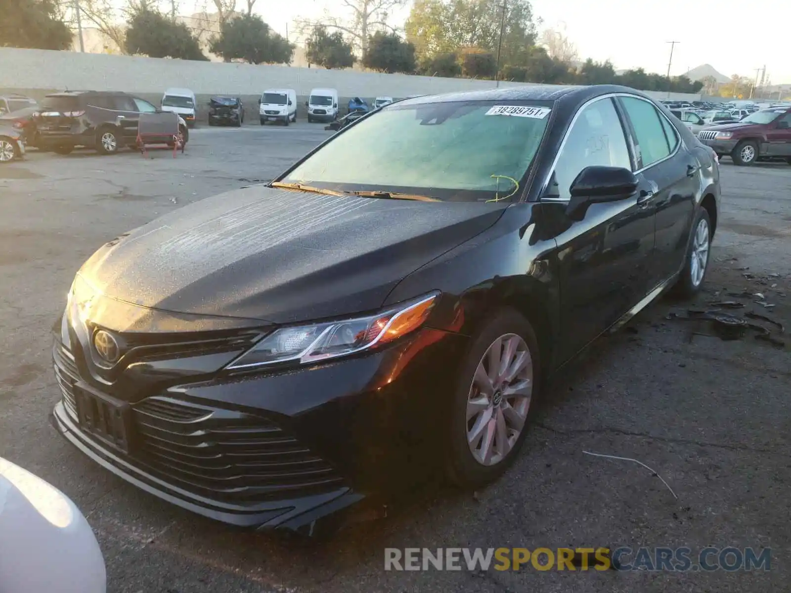 2 Photograph of a damaged car 4T1B11HK4KU725688 TOYOTA CAMRY 2019