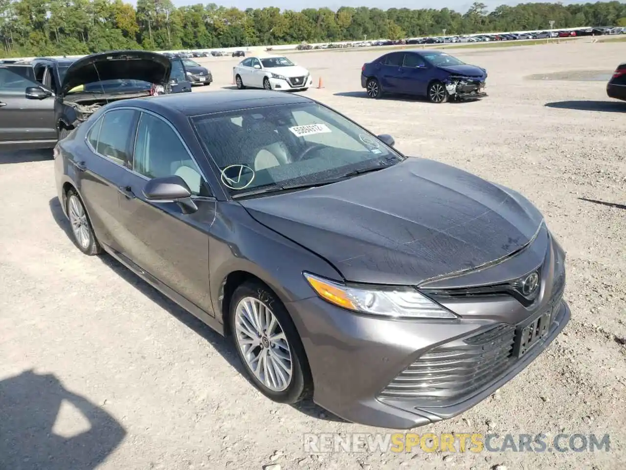 1 Photograph of a damaged car 4T1B11HK4KU725917 TOYOTA CAMRY 2019