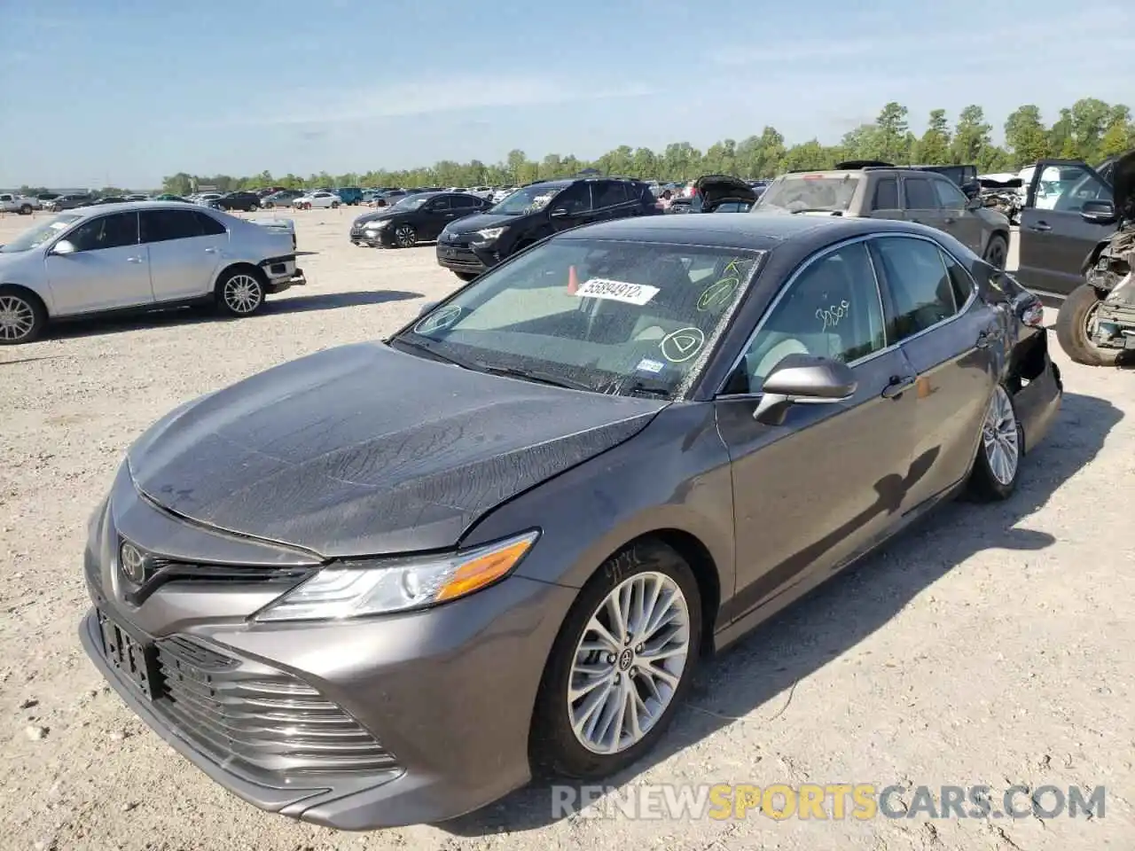 2 Photograph of a damaged car 4T1B11HK4KU725917 TOYOTA CAMRY 2019