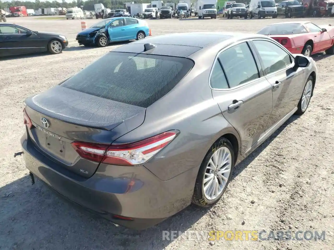 4 Photograph of a damaged car 4T1B11HK4KU725917 TOYOTA CAMRY 2019