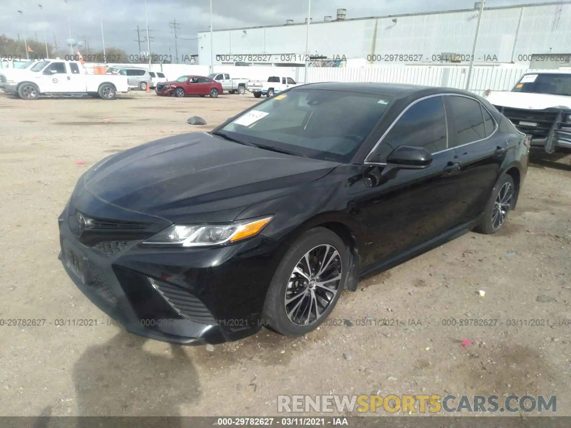 2 Photograph of a damaged car 4T1B11HK4KU726209 TOYOTA CAMRY 2019