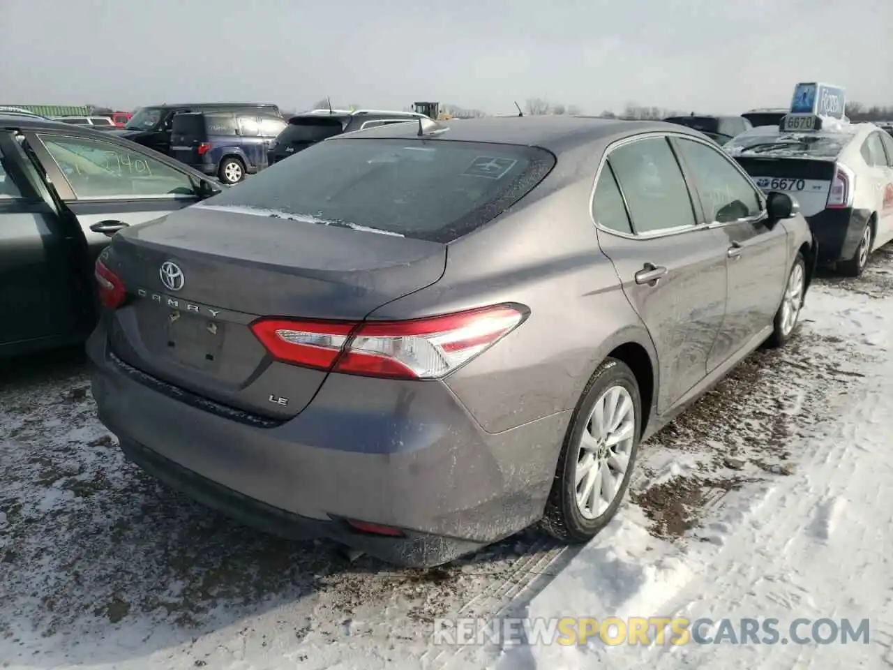 4 Photograph of a damaged car 4T1B11HK4KU727957 TOYOTA CAMRY 2019