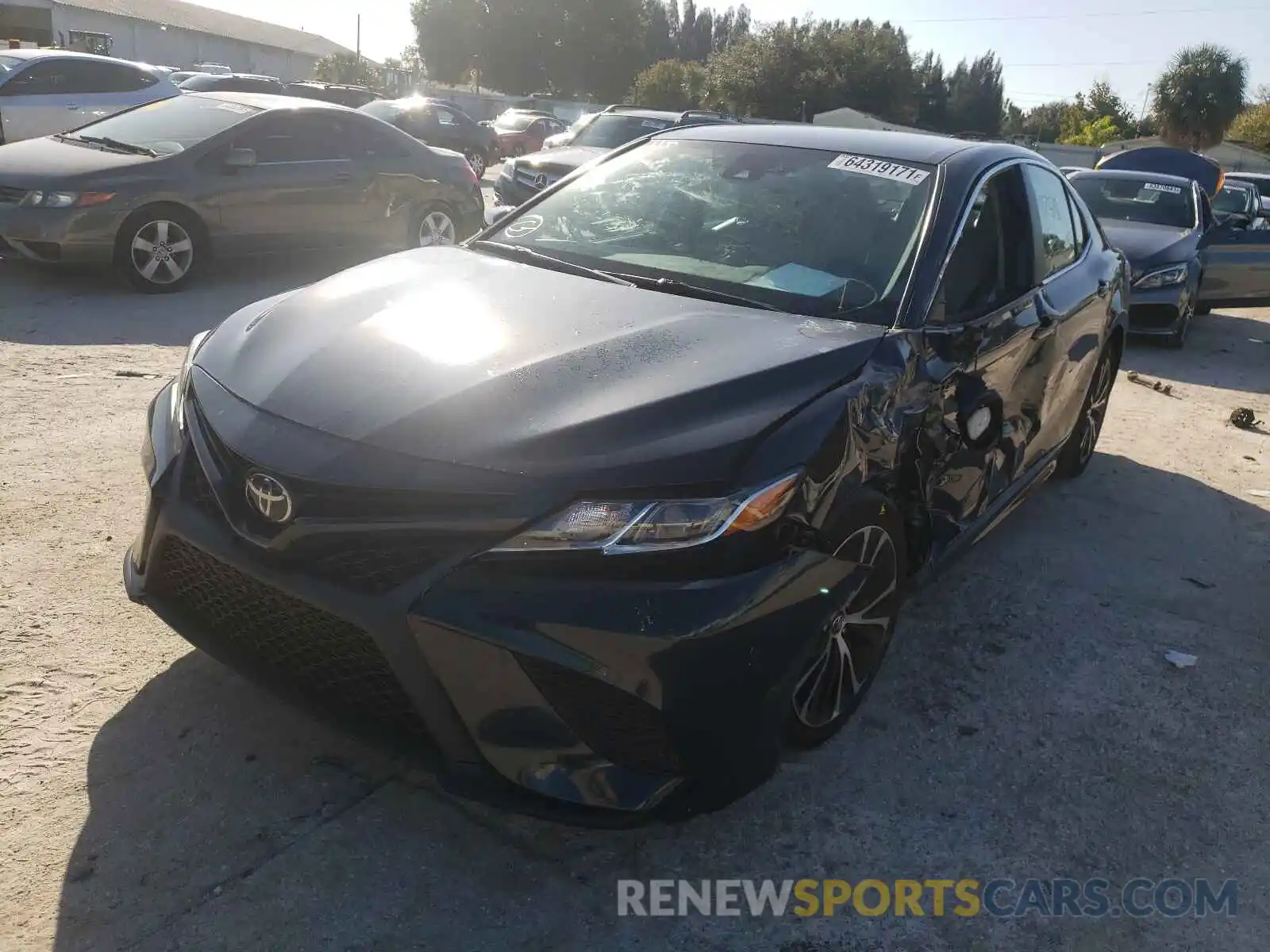 2 Photograph of a damaged car 4T1B11HK4KU728171 TOYOTA CAMRY 2019