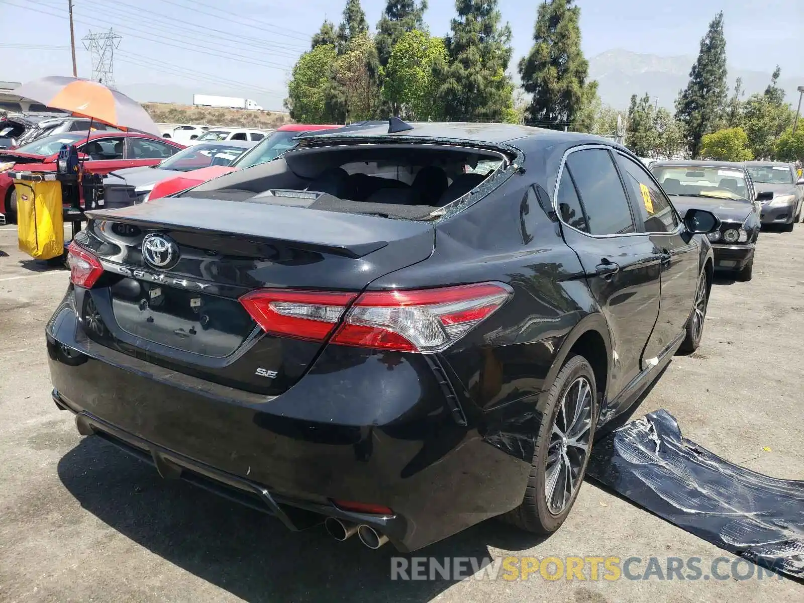 4 Photograph of a damaged car 4T1B11HK4KU729482 TOYOTA CAMRY 2019