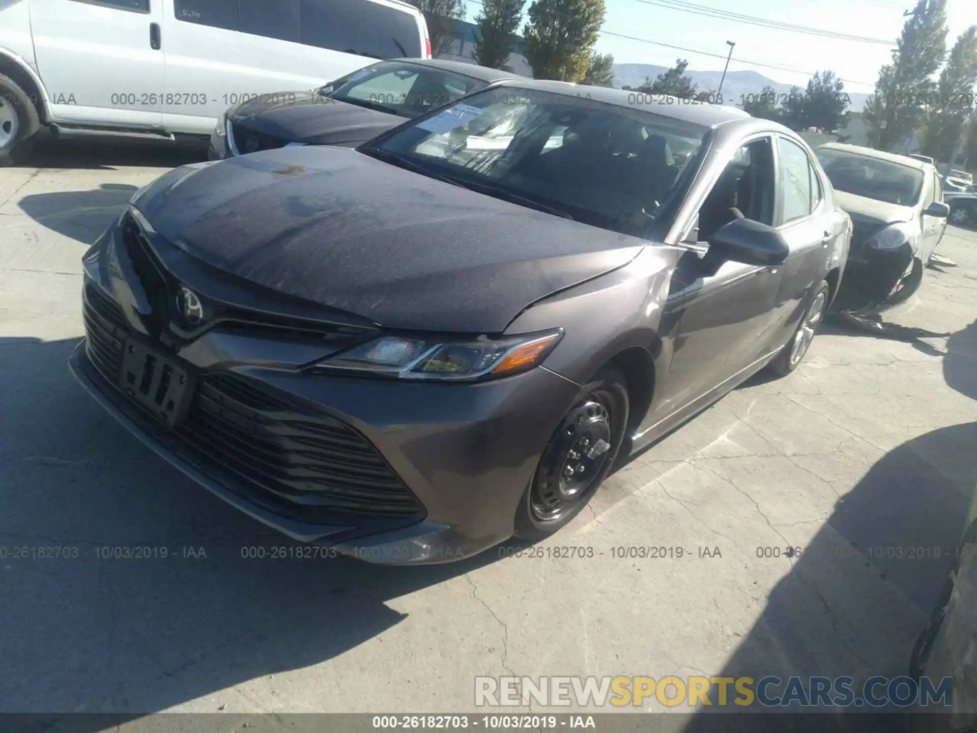 2 Photograph of a damaged car 4T1B11HK4KU730034 TOYOTA CAMRY 2019