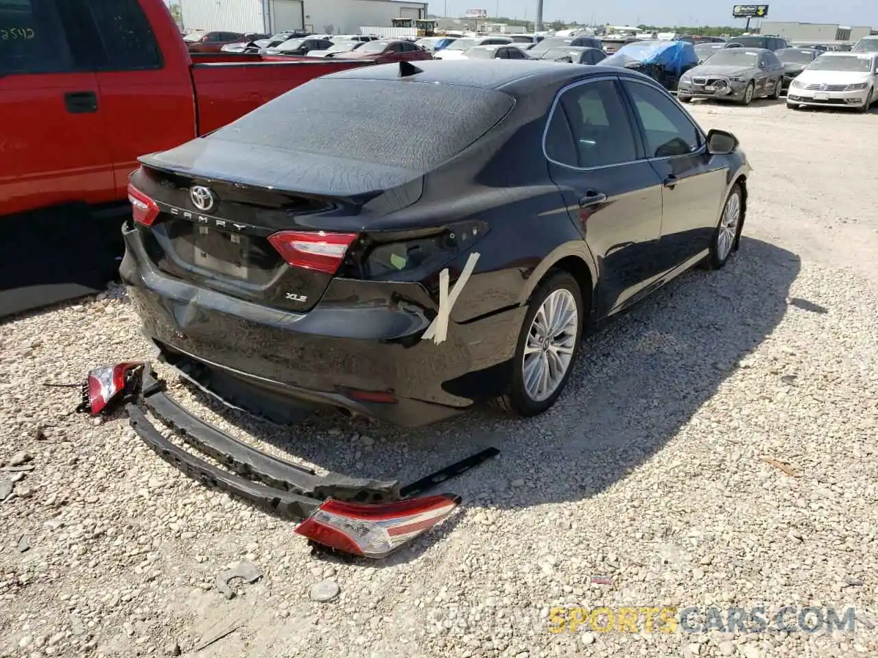 4 Photograph of a damaged car 4T1B11HK4KU734228 TOYOTA CAMRY 2019