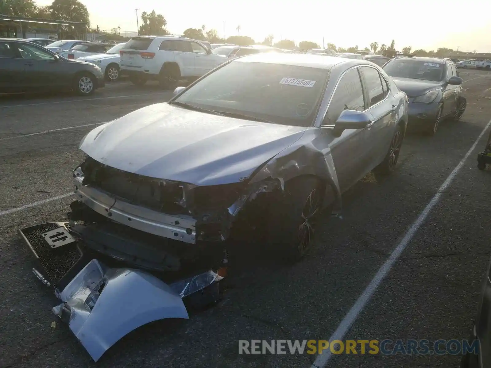 2 Photograph of a damaged car 4T1B11HK4KU737713 TOYOTA CAMRY 2019