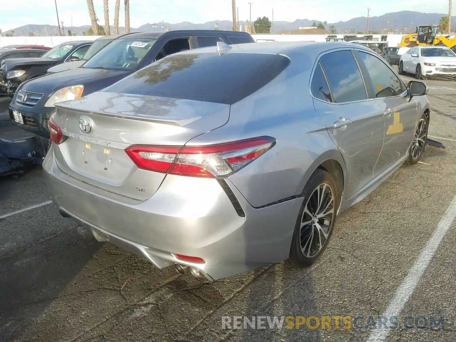 4 Photograph of a damaged car 4T1B11HK4KU737713 TOYOTA CAMRY 2019