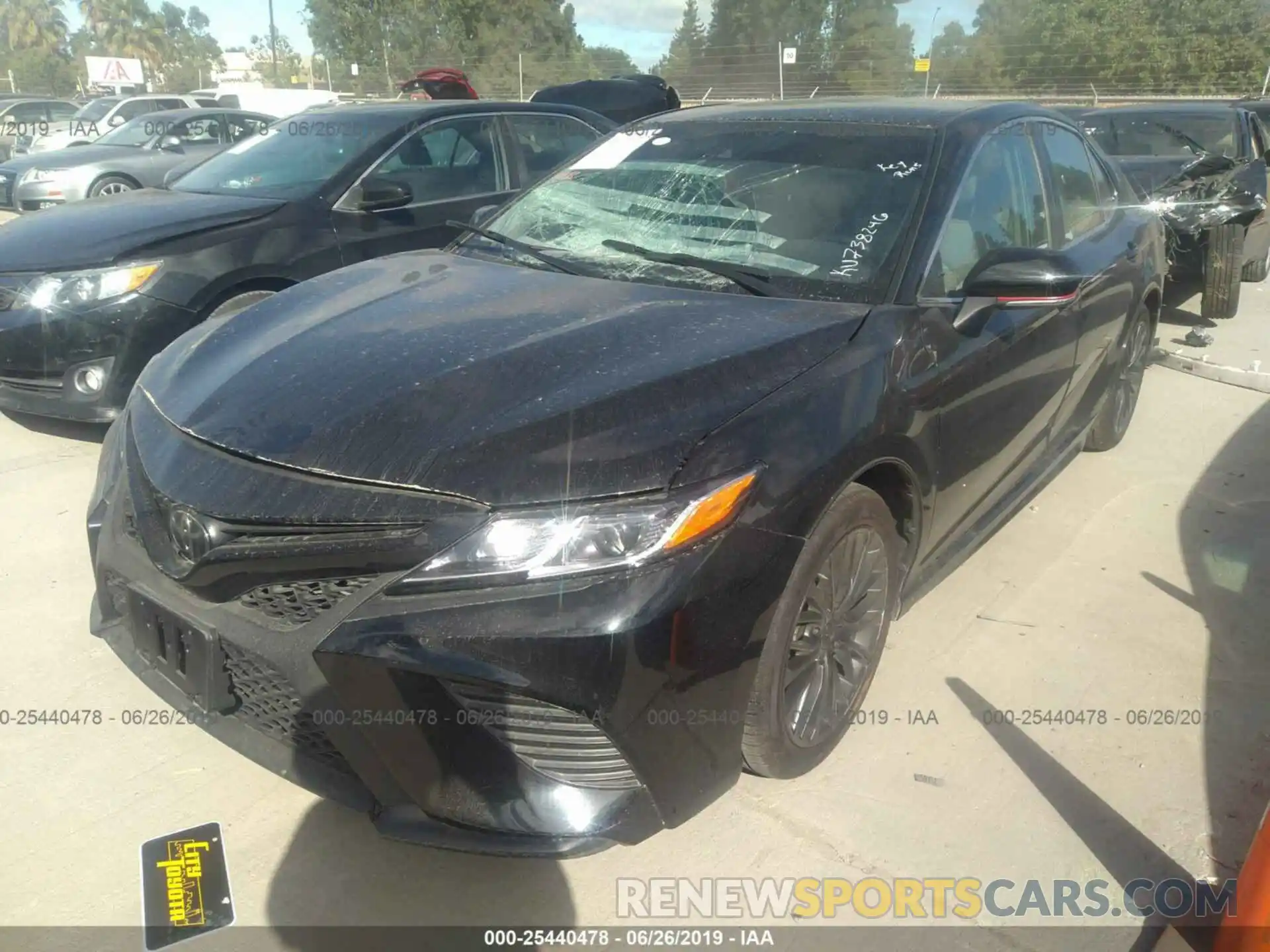 2 Photograph of a damaged car 4T1B11HK4KU738246 TOYOTA CAMRY 2019