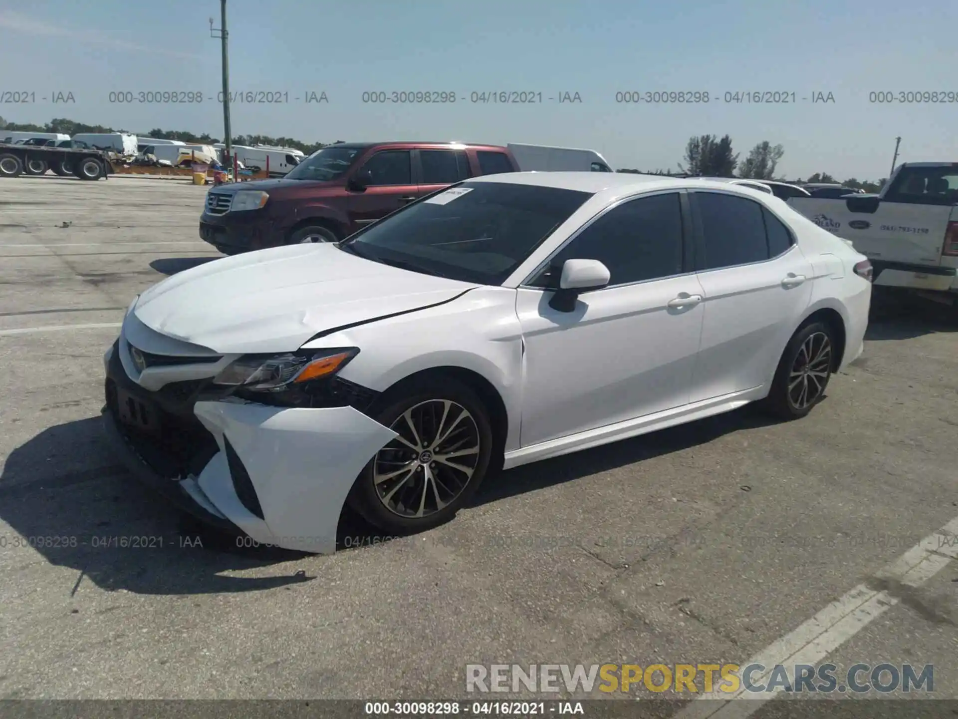 2 Photograph of a damaged car 4T1B11HK4KU739378 TOYOTA CAMRY 2019