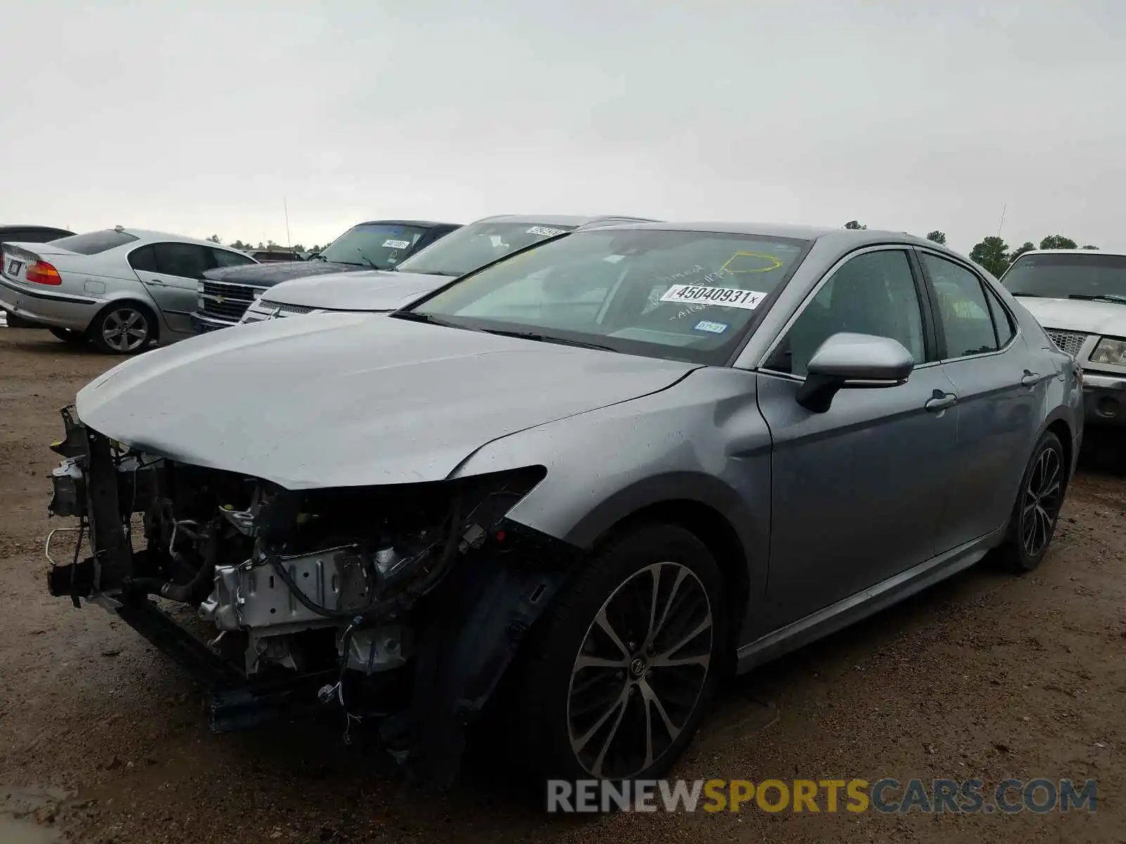 2 Photograph of a damaged car 4T1B11HK4KU739719 TOYOTA CAMRY 2019