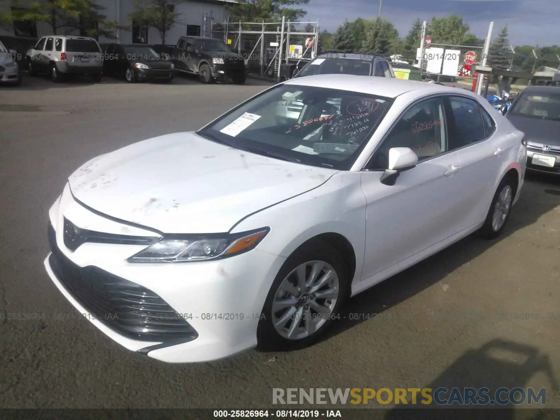 2 Photograph of a damaged car 4T1B11HK4KU741230 TOYOTA CAMRY 2019