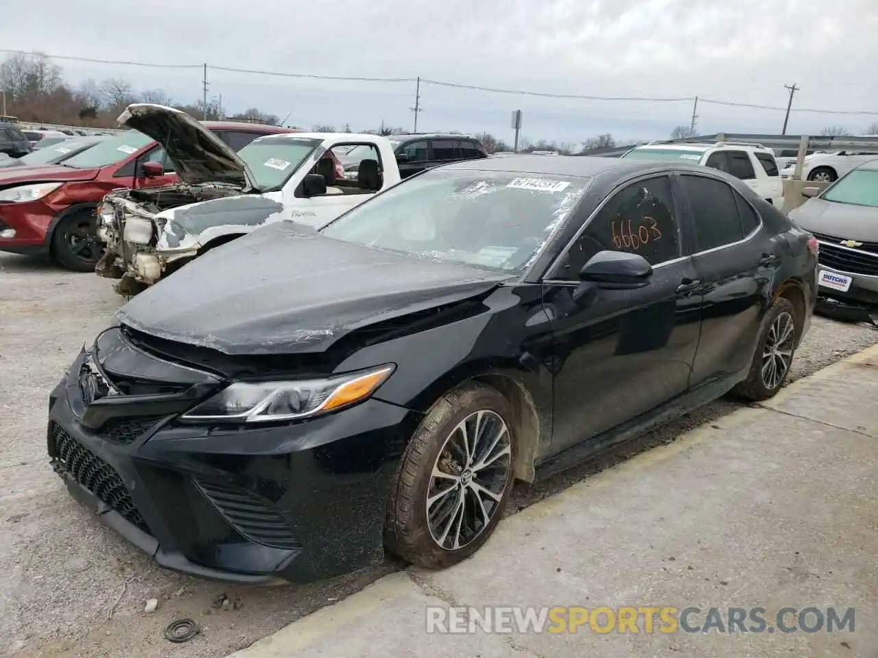 2 Photograph of a damaged car 4T1B11HK4KU743169 TOYOTA CAMRY 2019