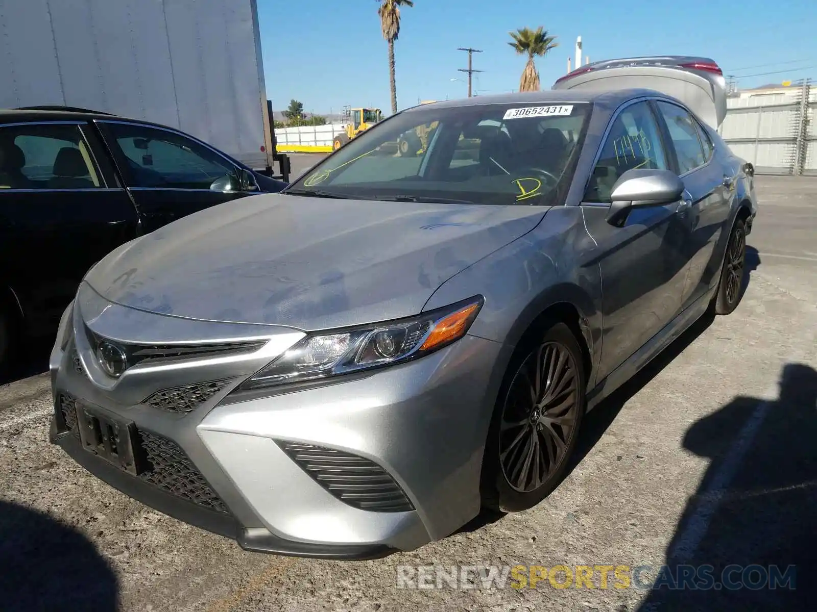 2 Photograph of a damaged car 4T1B11HK4KU743222 TOYOTA CAMRY 2019